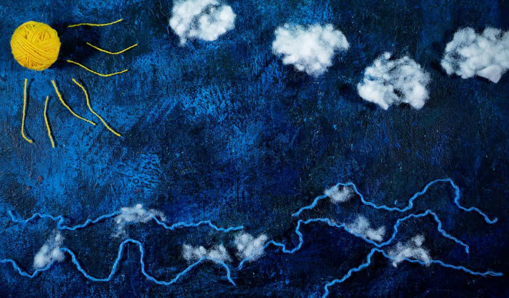 1024x600, blue surface, yellow yarn sun, SD Desktop Wallpaper