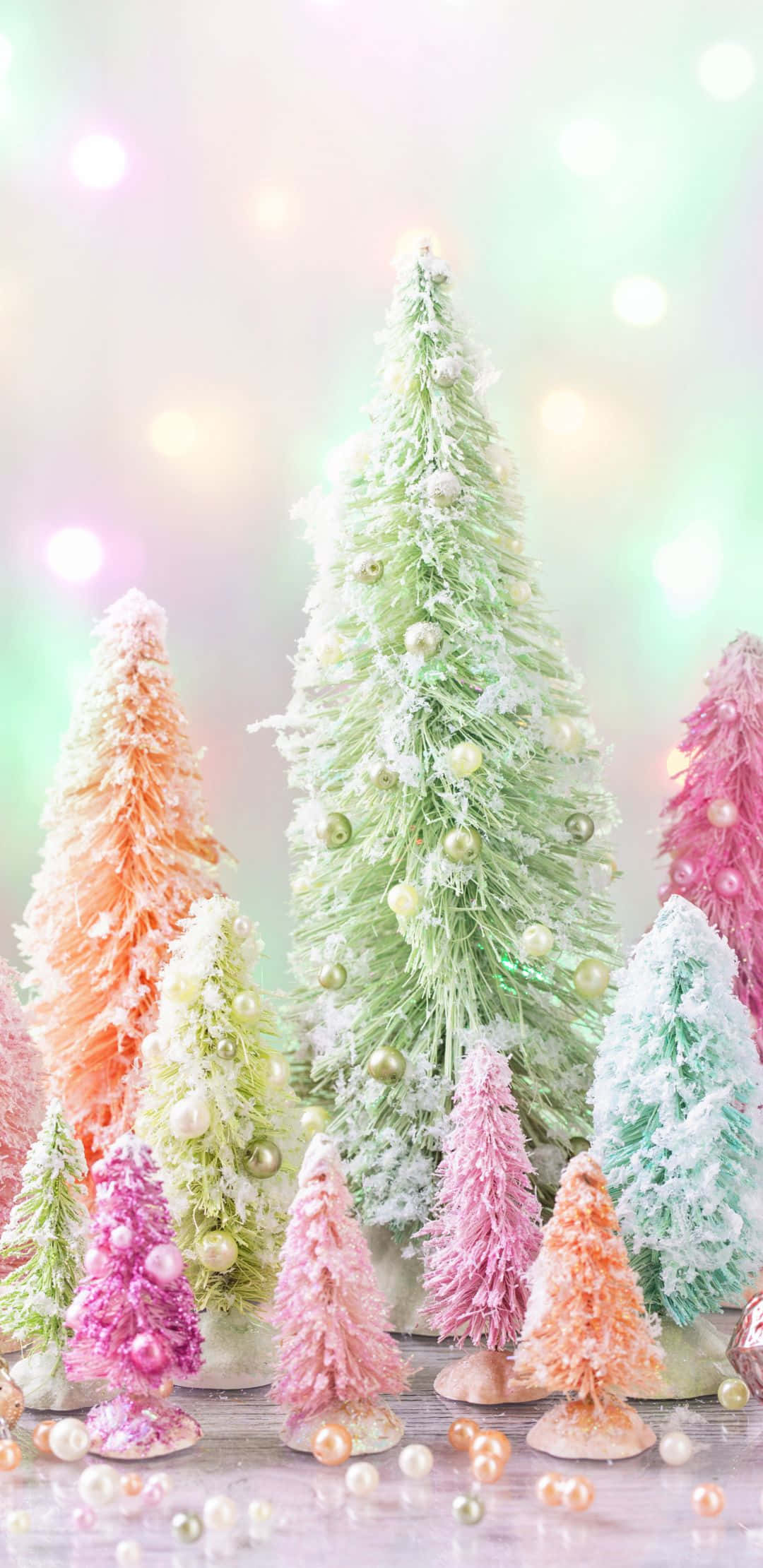 pastel-colored bottlebrush trees, faux snow, pearl ornaments, Full HD Phone Wallpaper