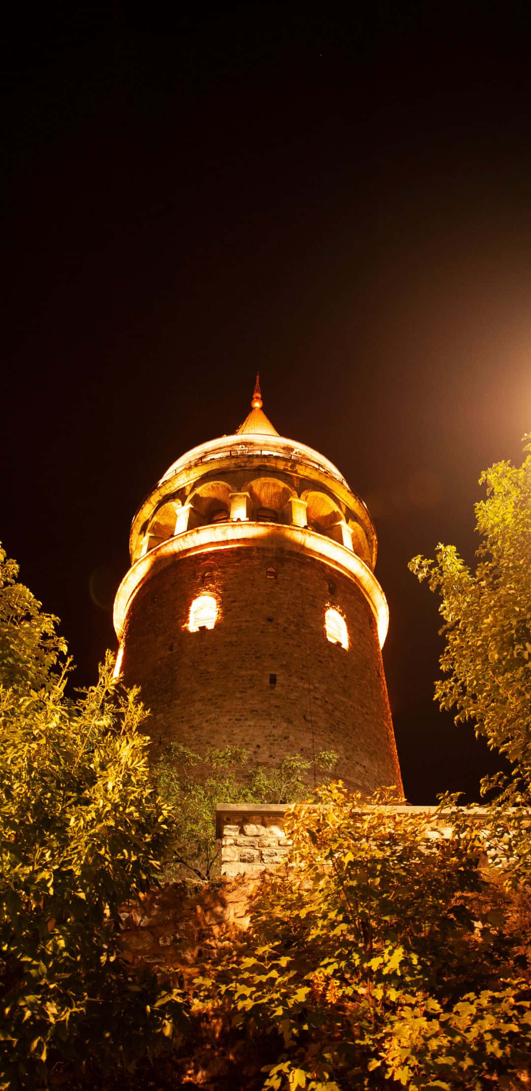 historic stone tower, warm lights, dark night sky, Full HD Phone Wallpaper