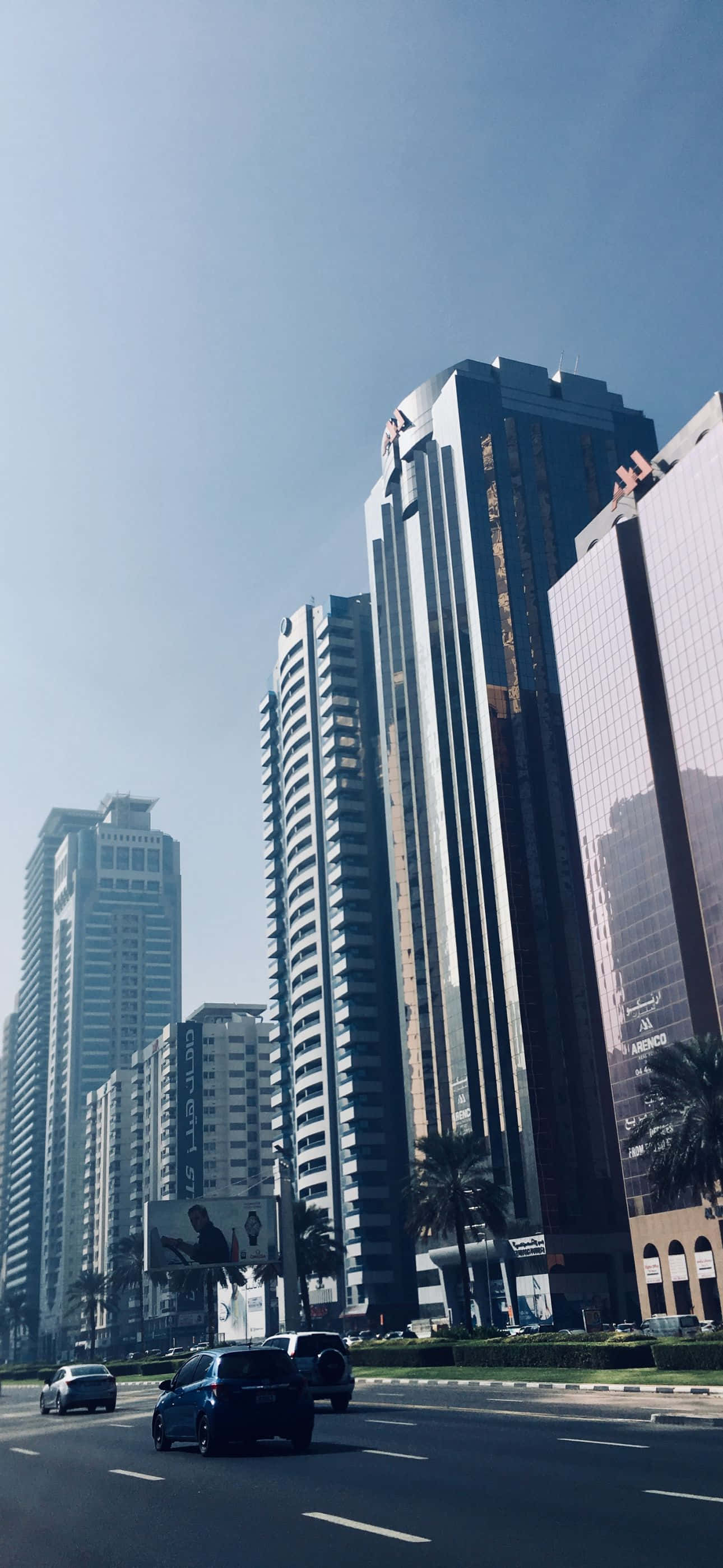 1290x2796, tall buildings, cars driving down the street, 2K Phone Wallpaper