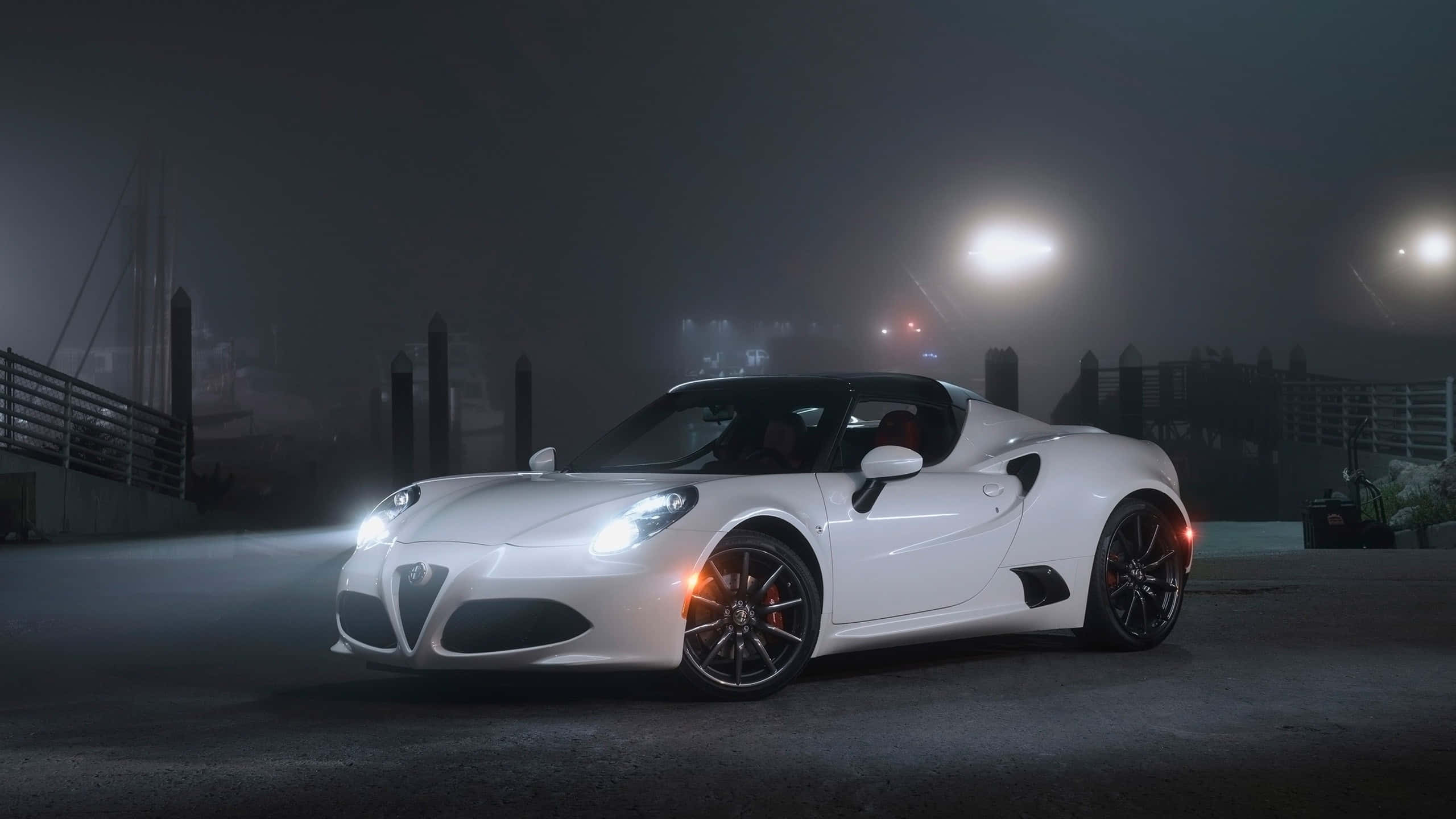 sleek white sports car, streetlights, foggy urban night scene, 2K Desktop Wallpaper