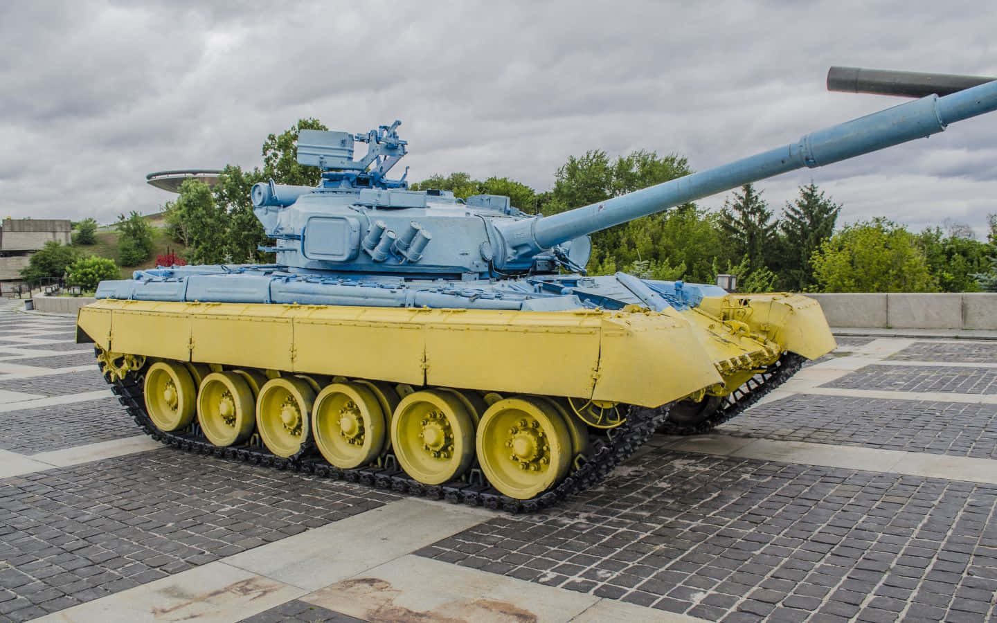 blue and yellow military tank, checkered pavement, overcast sky, HD Desktop Wallpaper