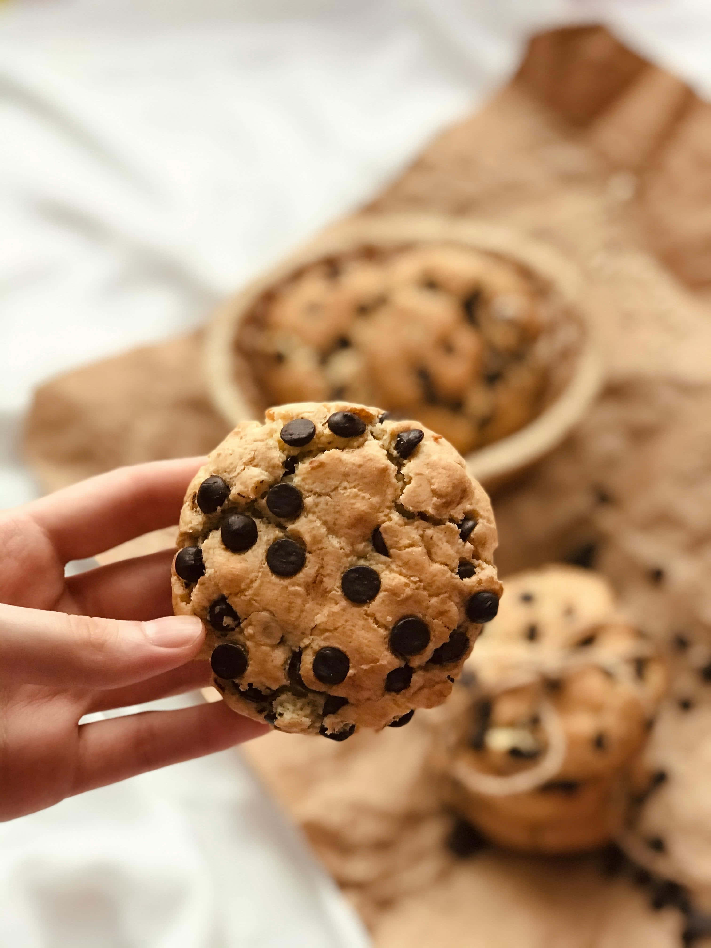 chocolate chip cookie, hand, melted chips, 4K Phone Wallpaper