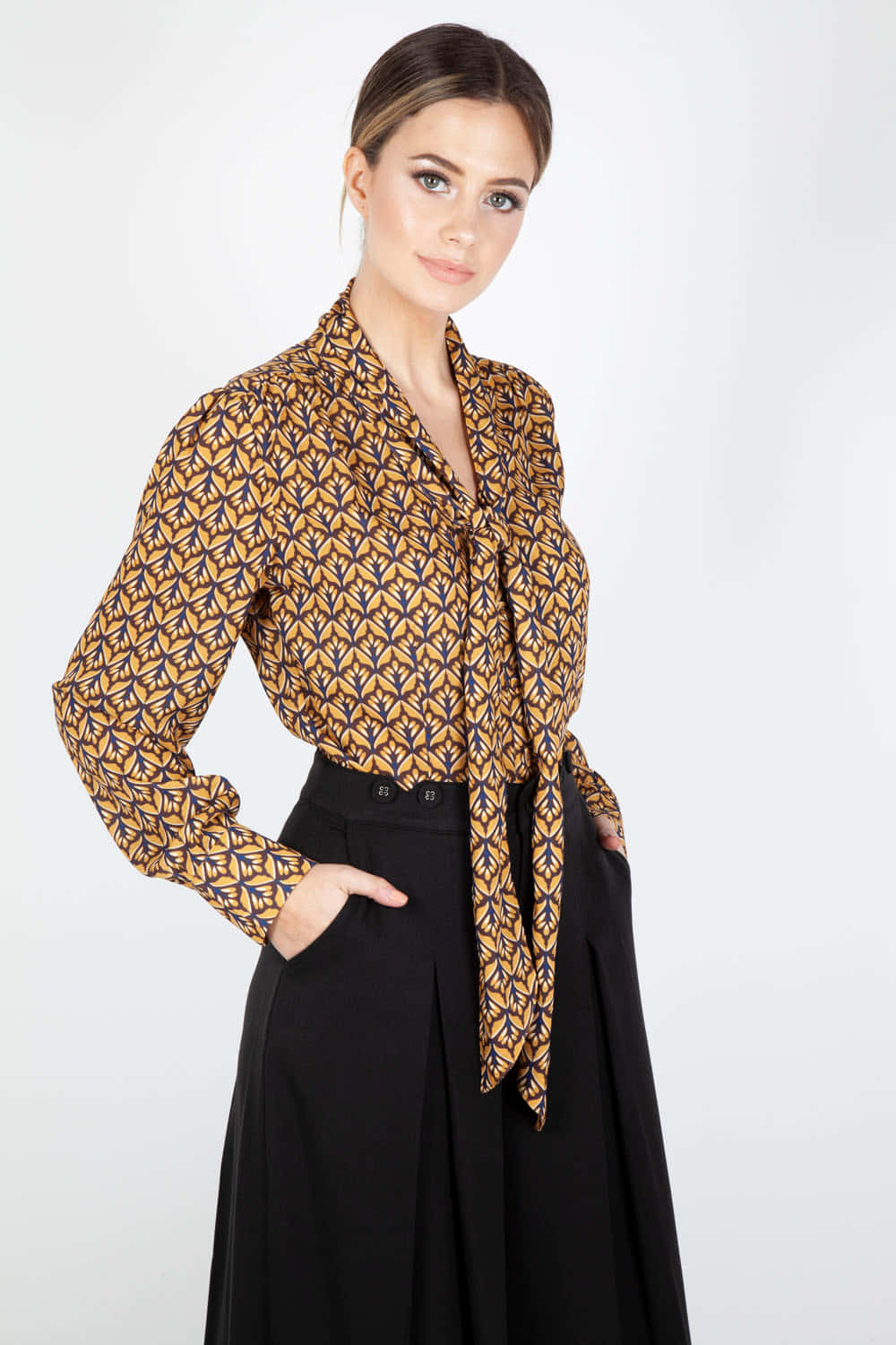 gold and navy leaf patterned blouse, black pleated skirt, white background, HD Phone Wallpaper