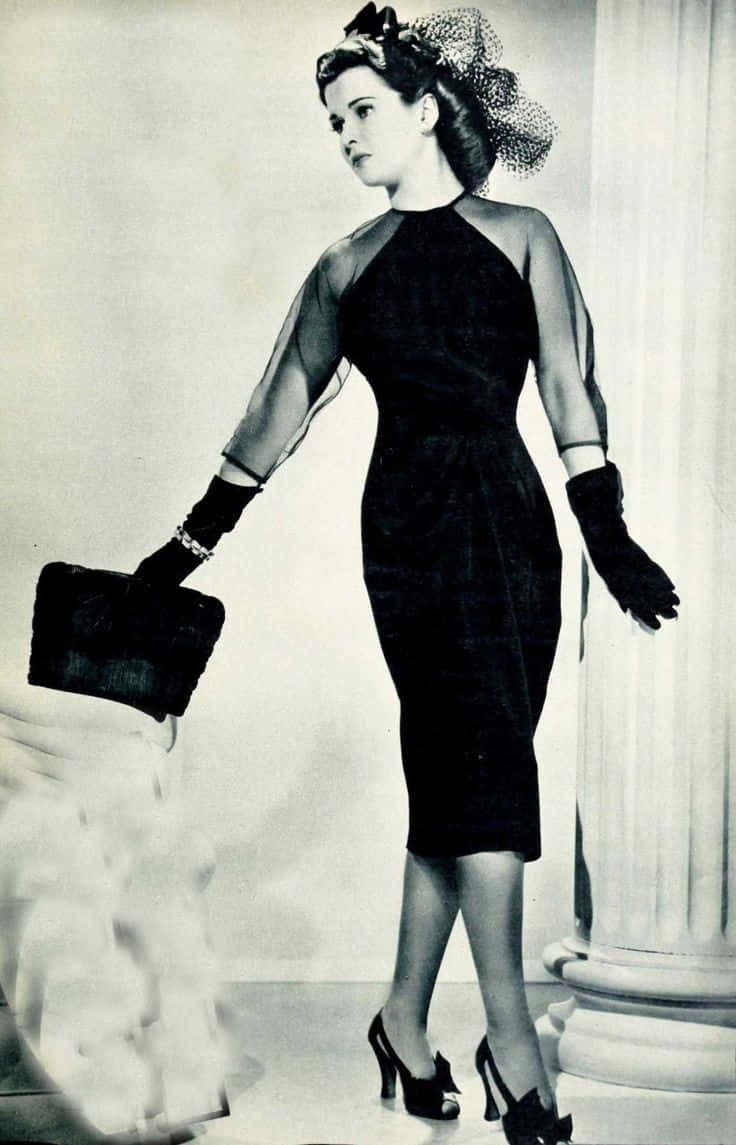 1940s Fashion, black sheer-sleeved dress, gloves, SD Phone Wallpaper