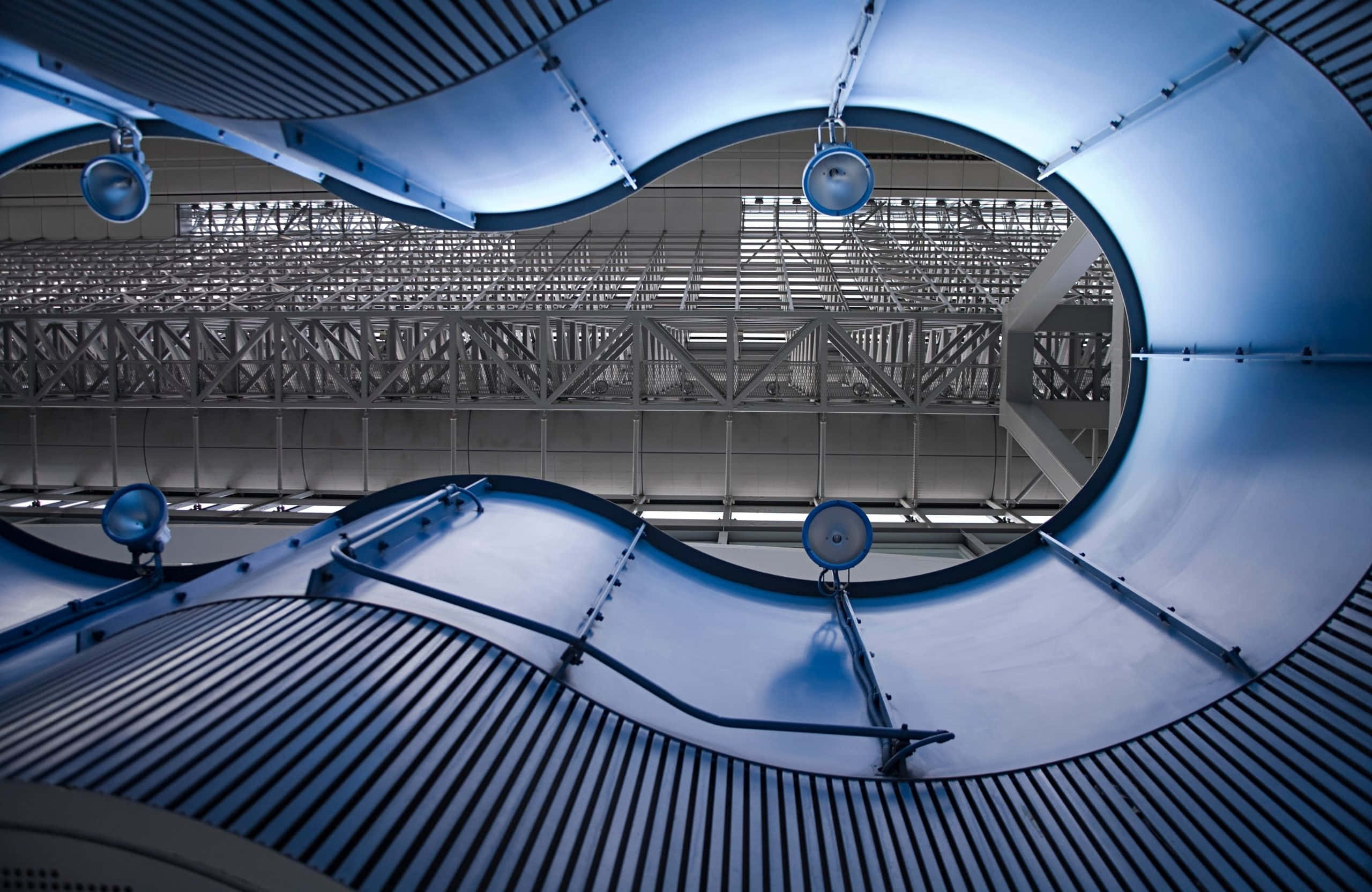 2560x1664, futuristic blue curved architectural interior, metallic ribbed ceilings, 2K Desktop Wallpaper