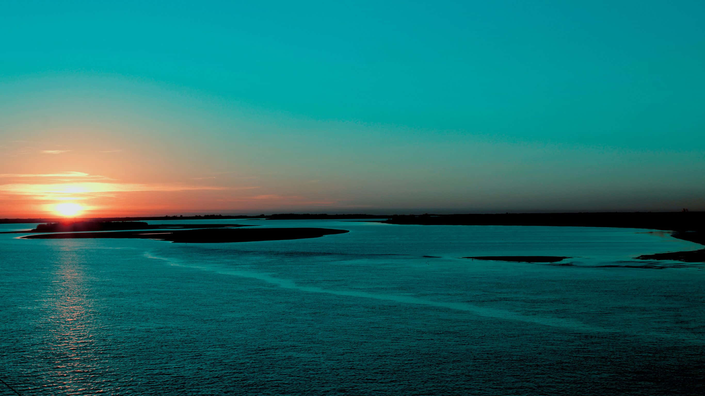 sunset, calm river, silhouetted landforms, 2K Desktop Wallpaper