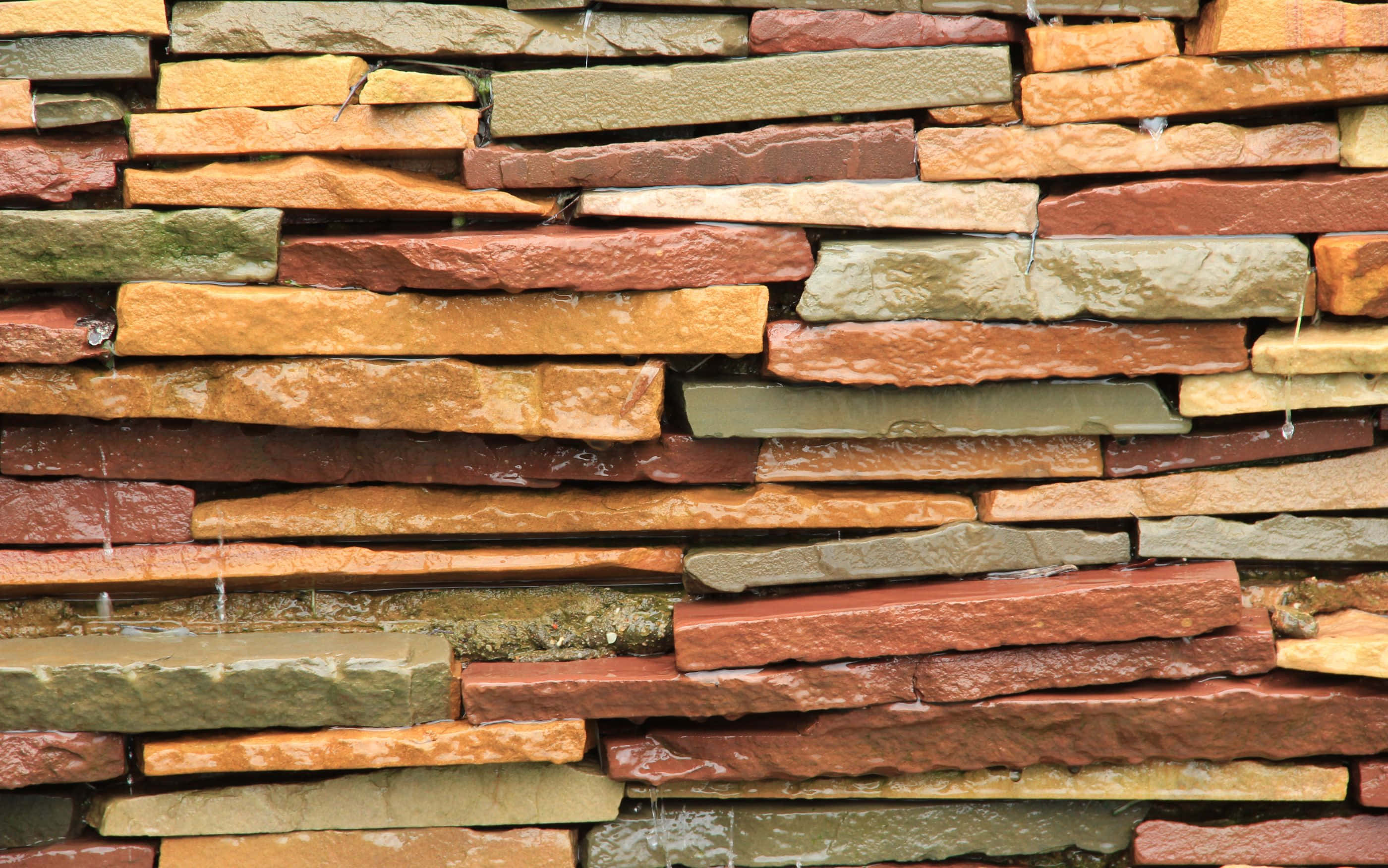 2800x1752, stacked stone wall, water trickling, 2K Desktop Wallpaper