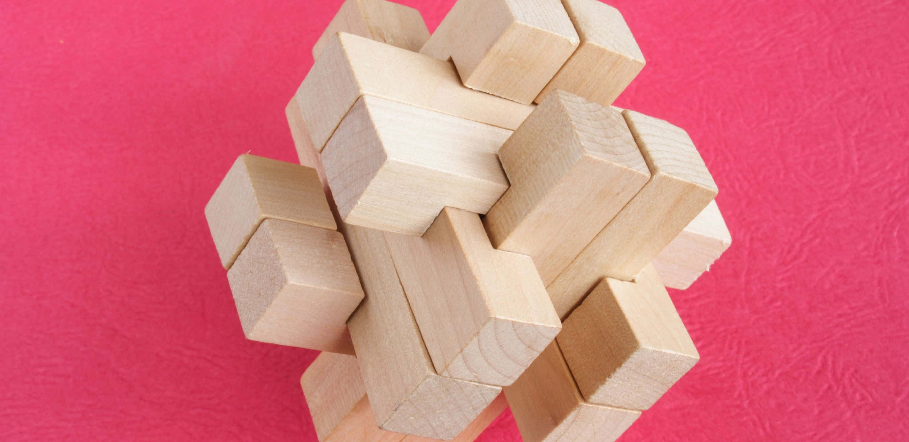 2960x1440, 3D wooden puzzle, textured vibrant pink background, 2K Desktop Wallpaper