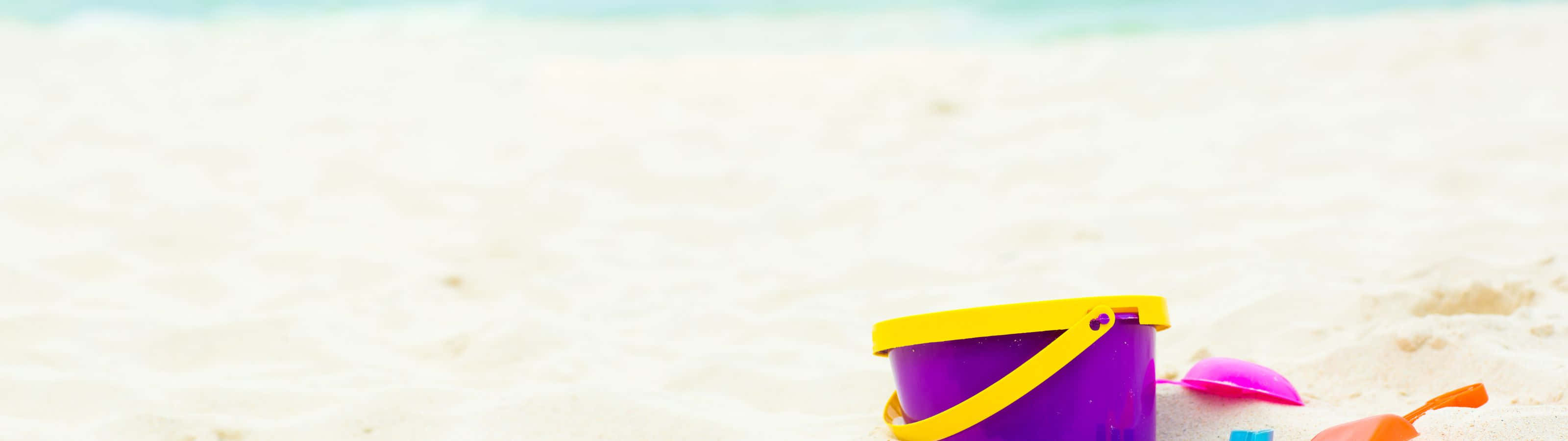 purple and yellow beach pail, pink shovel, soft white sand, 2K Desktop Wallpaper