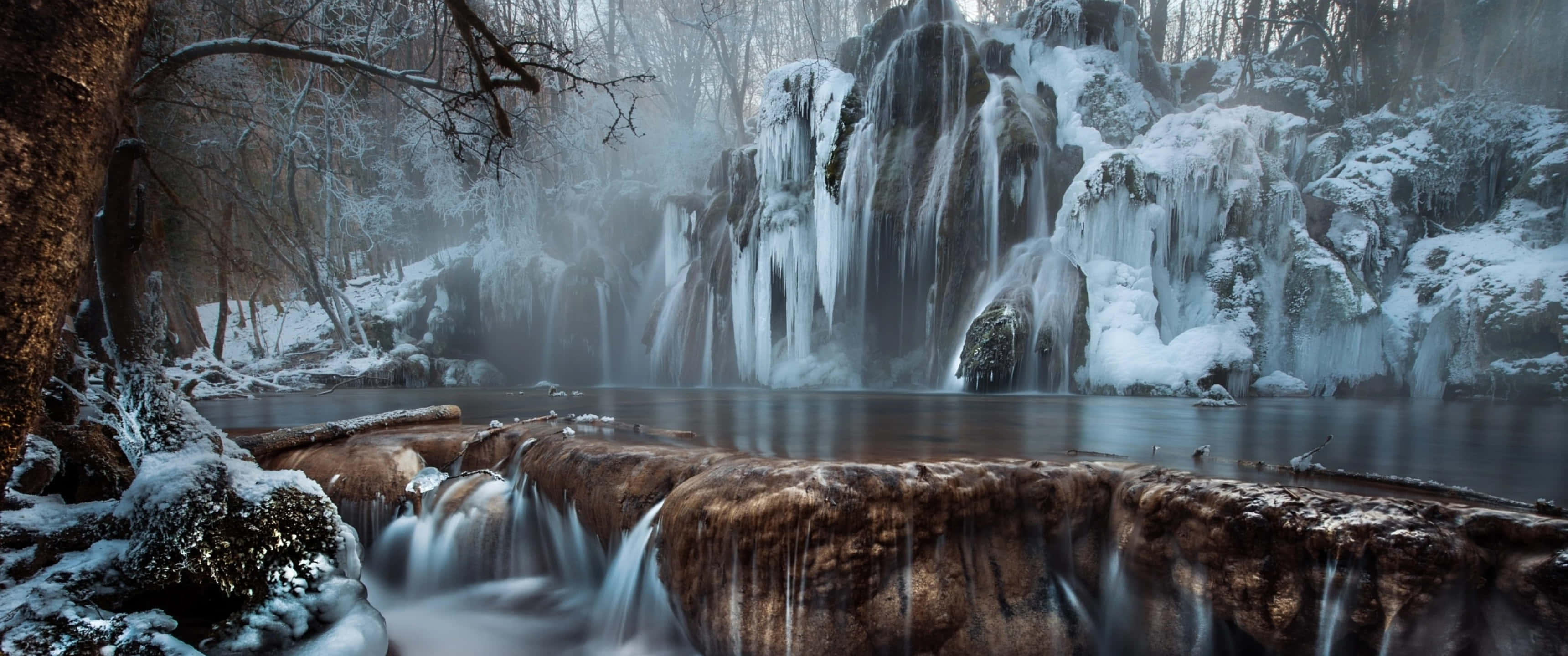 3440x1440 Winter, frozen waterfall, snowy forest, 2K Desktop Wallpaper
