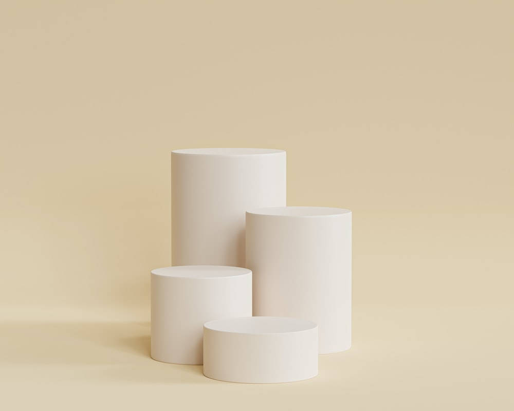 four white cylinders, matte white, staggered cluster, SD Desktop Wallpaper
