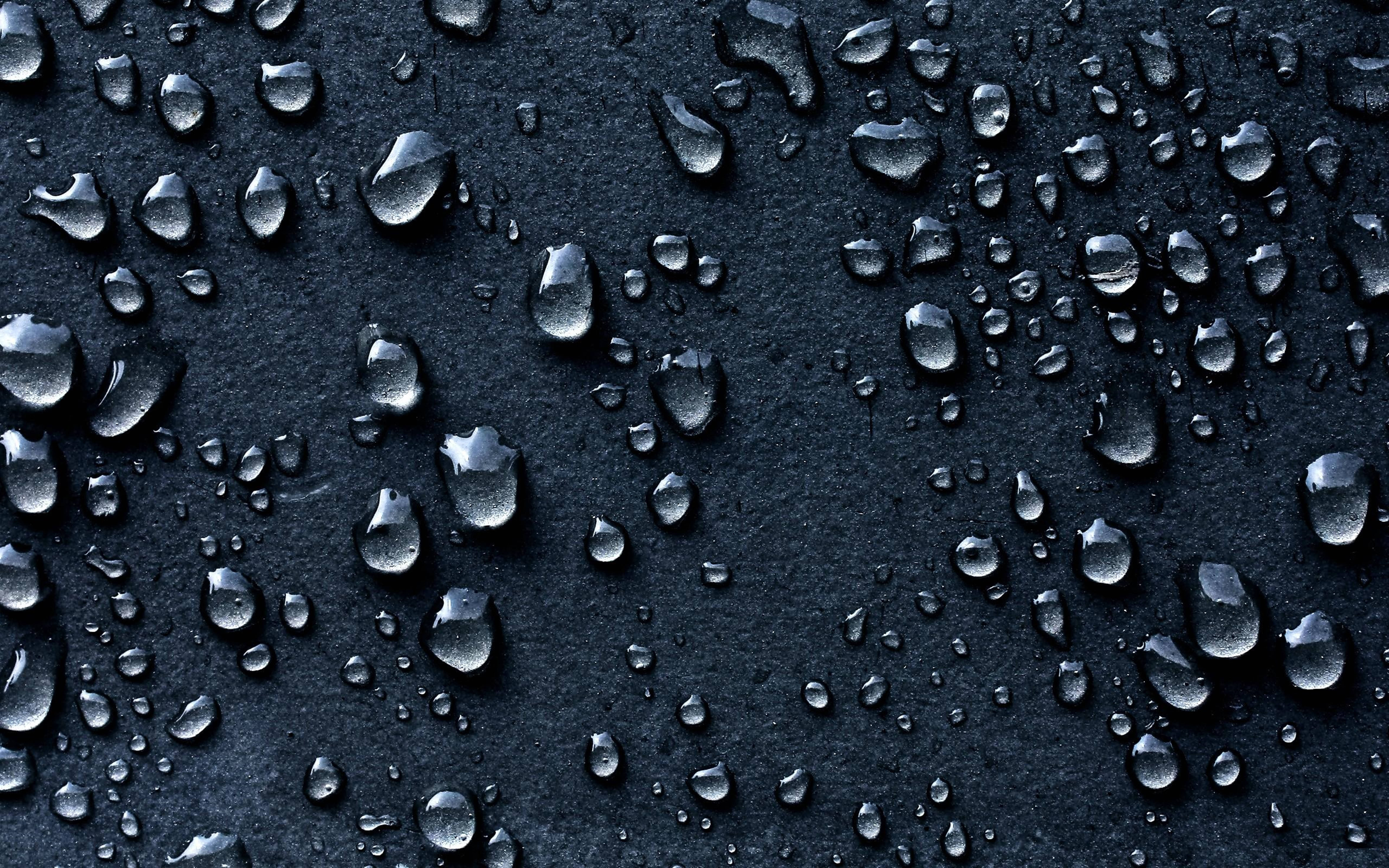 3d hd water droplets, matte black textured surface, glistening water droplets, 5K Desktop Wallpaper