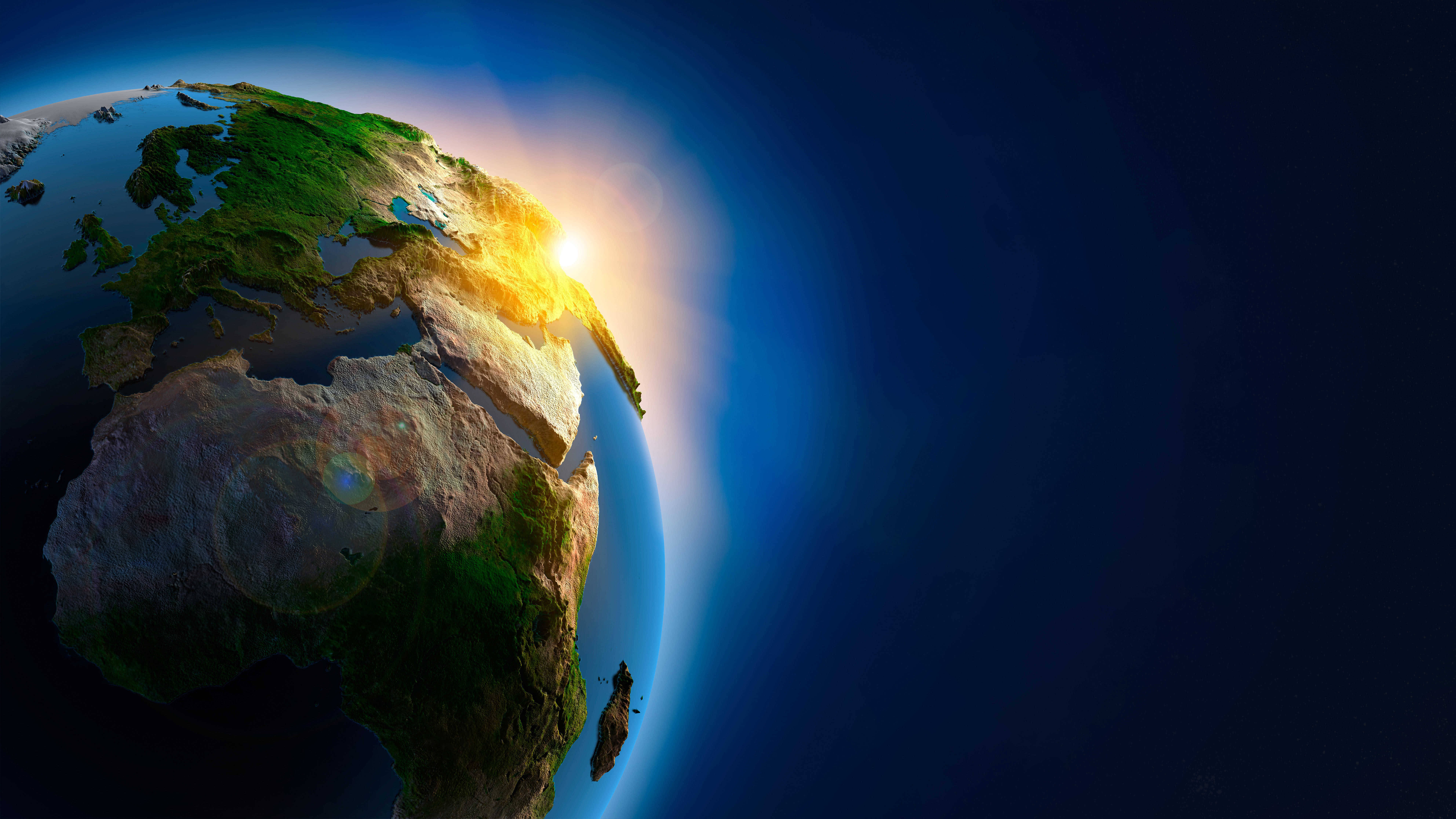planet Earth, sun rising over Europe and Africa, golden light on continents and oceans, 8K Desktop Wallpaper