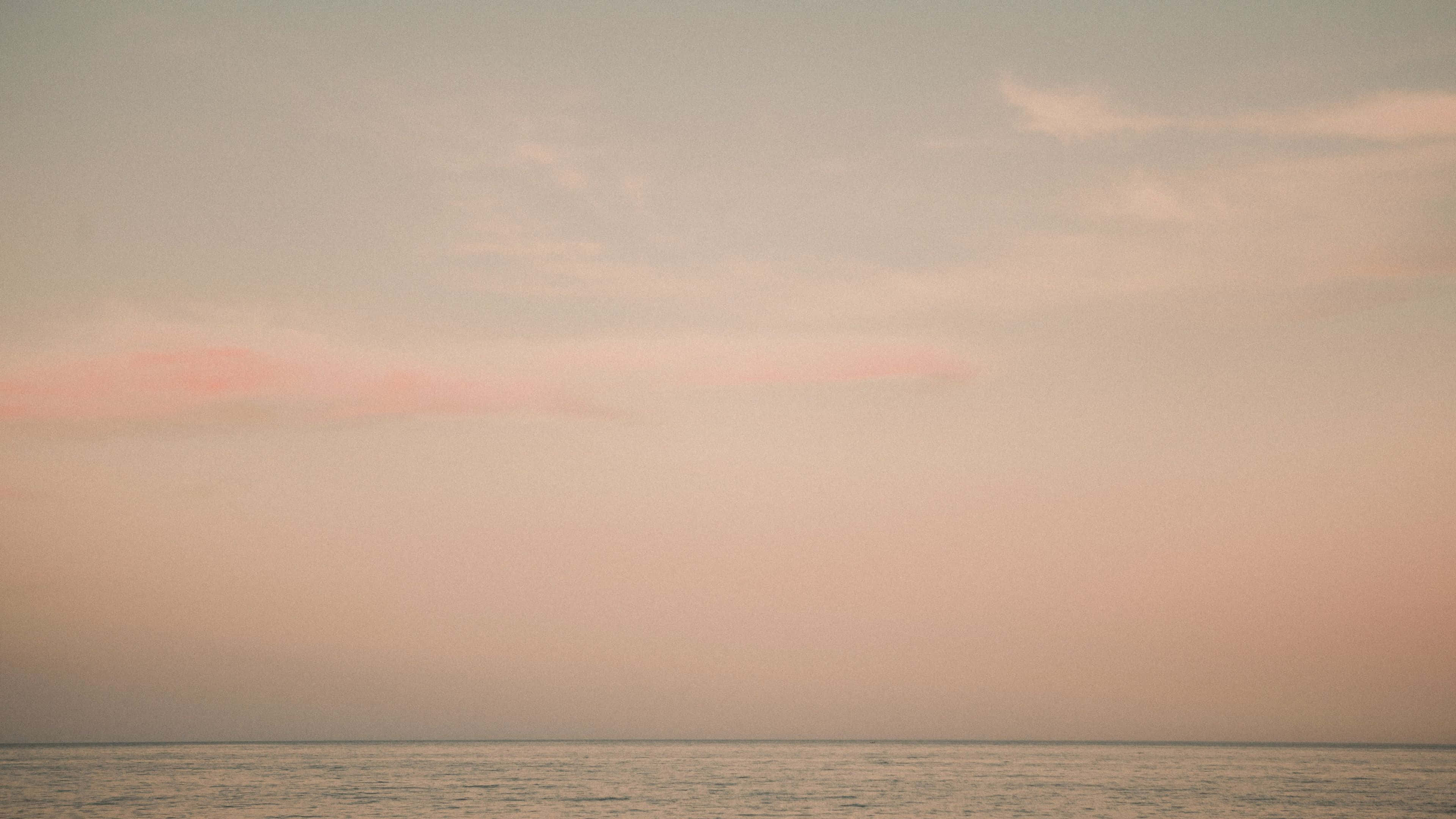 pastel sunset, ocean horizon, soft pink and peach hues, 4K Desktop Wallpaper