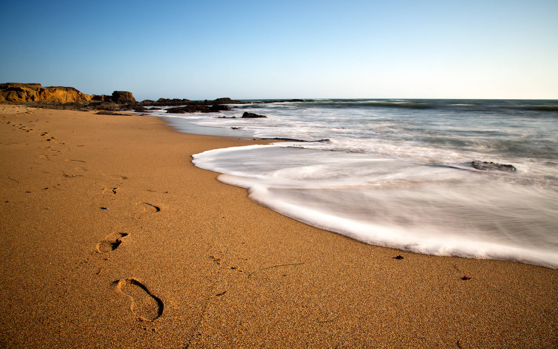 sand footprints, golden sand, gentle waves, Full HD Desktop Wallpaper