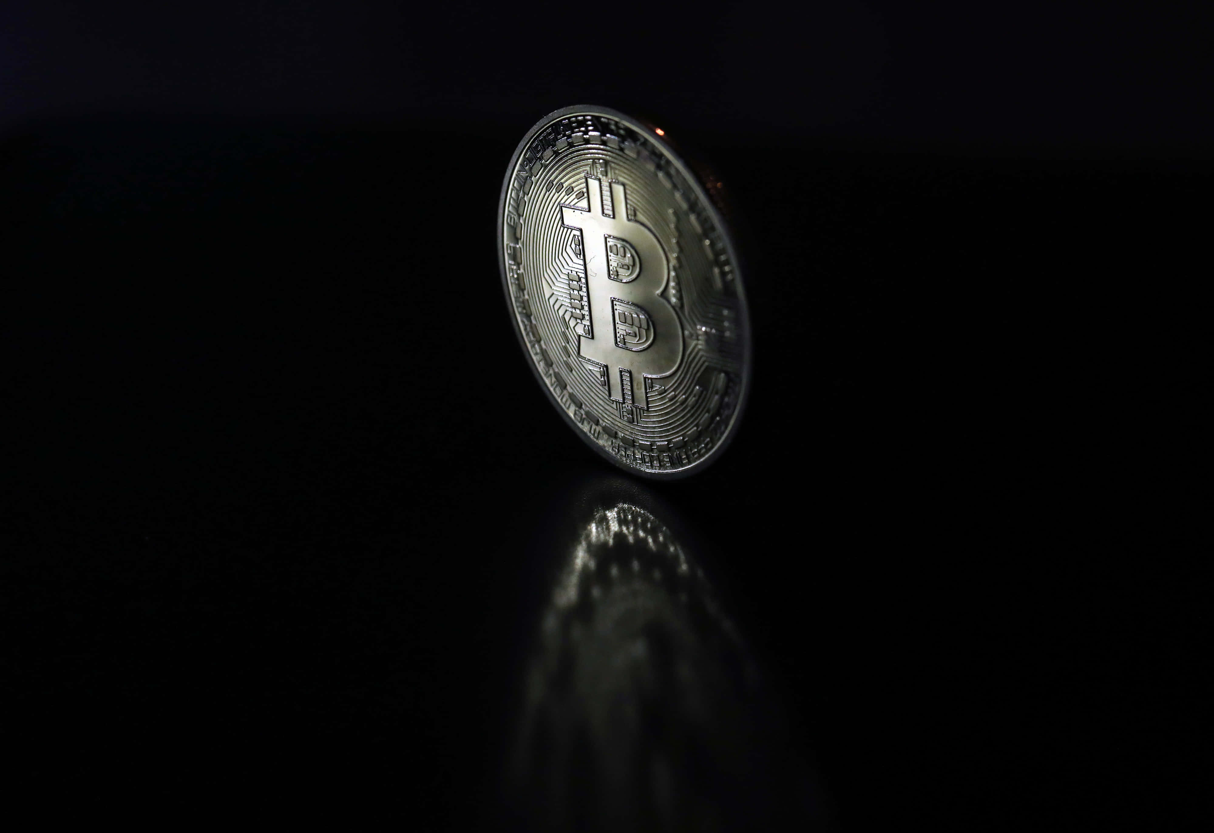 Bitcoin, silver, black surface, 4K Desktop Wallpaper