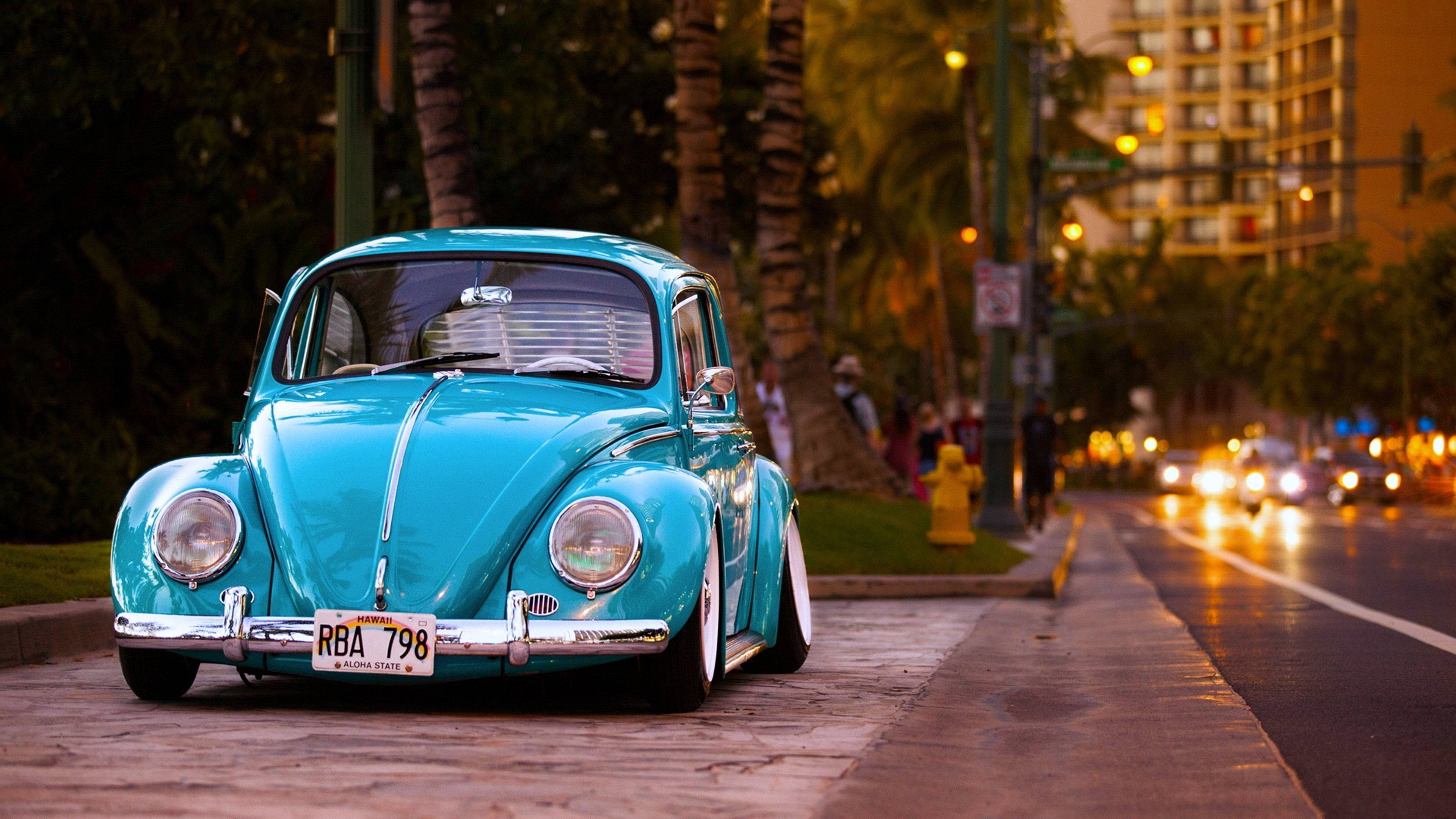 vibrant turquoise, vintage Volkswagen Beetle, wet city sidewalk, 4K Desktop Wallpaper