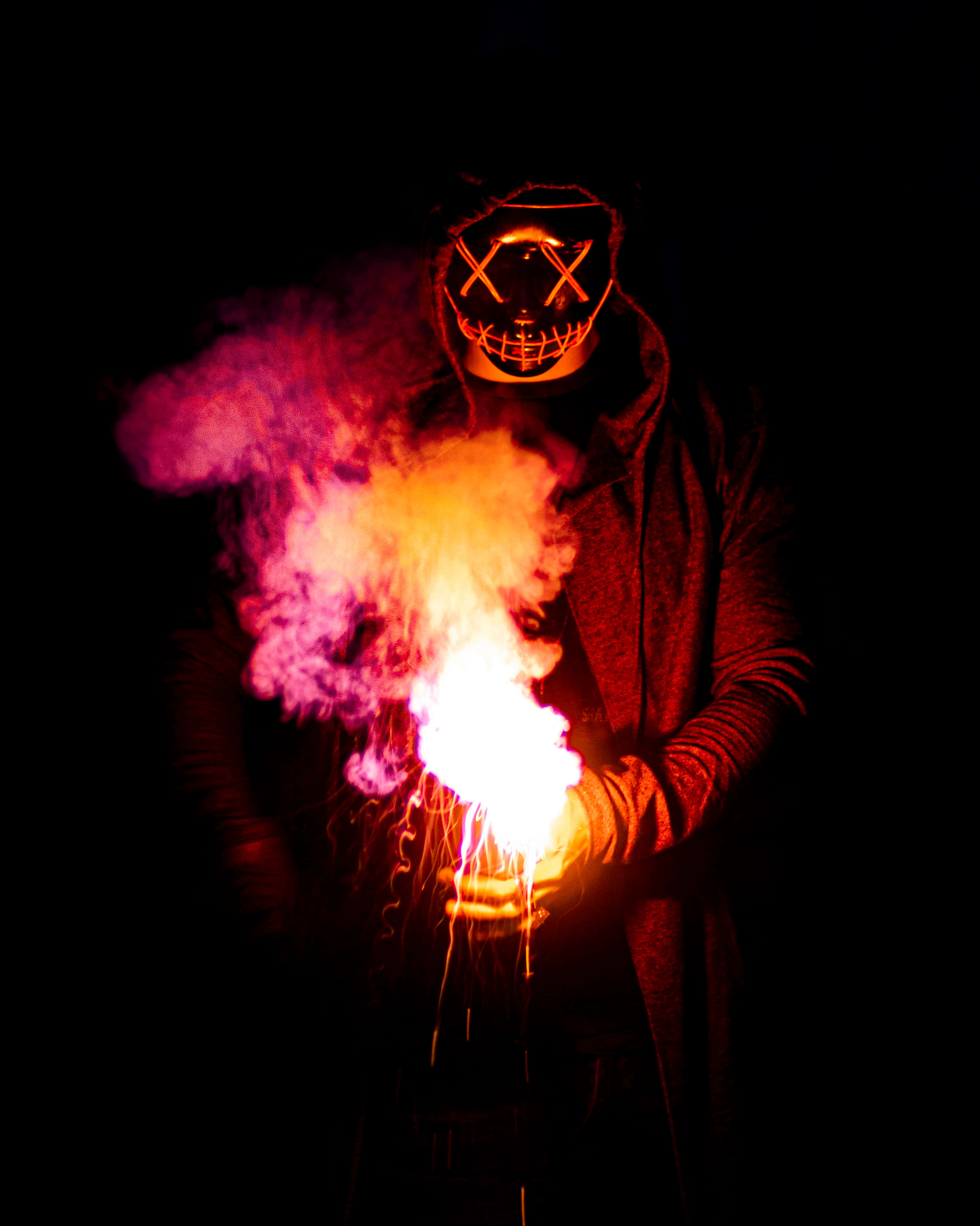 4K Ultra HD Devil Monster, glowing orange mask, fiery flare, 4K Phone Wallpaper