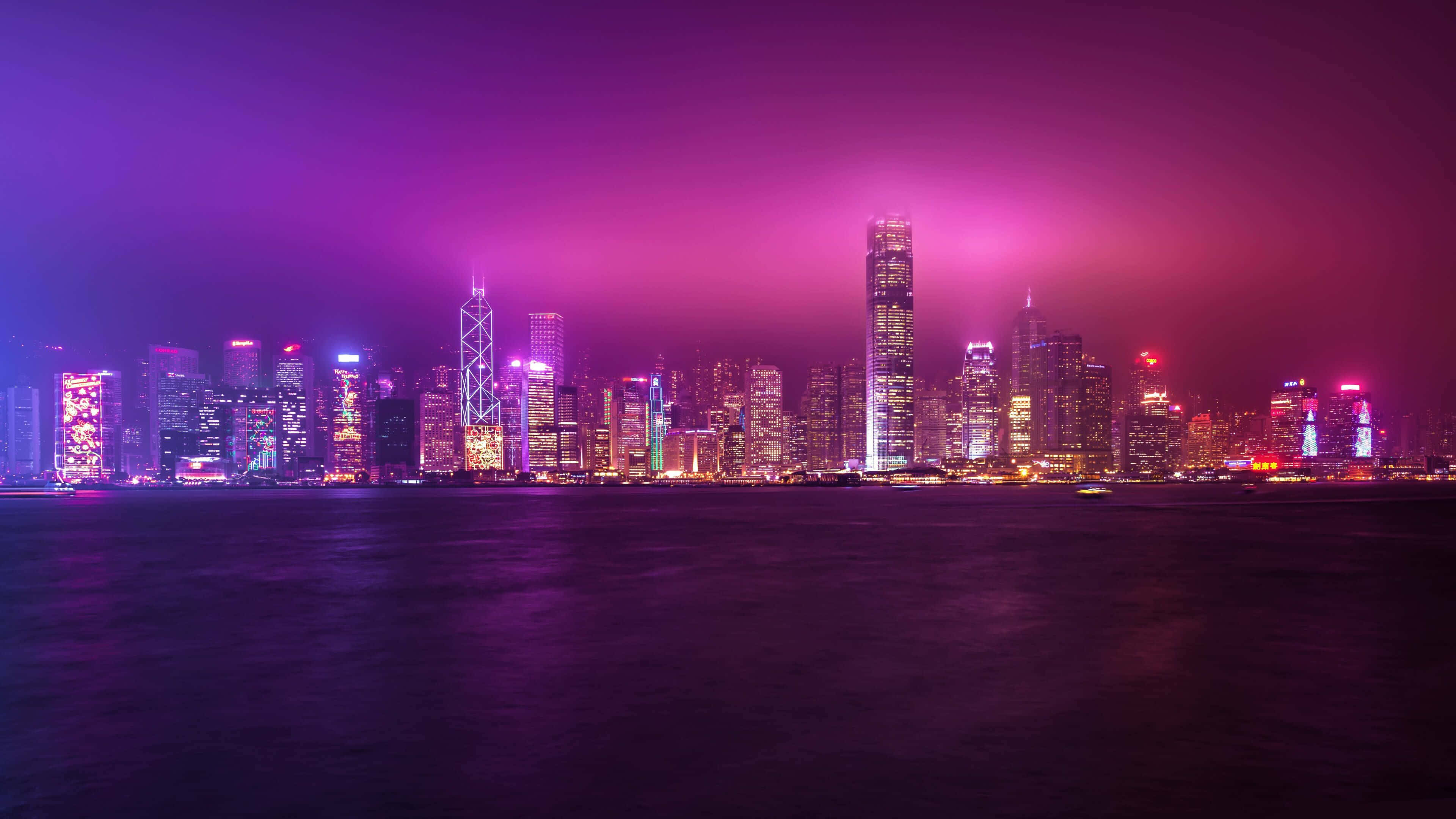 4K Display, 3840 x 2160, vibrant purple-hued city skyline, 4K Desktop Wallpaper