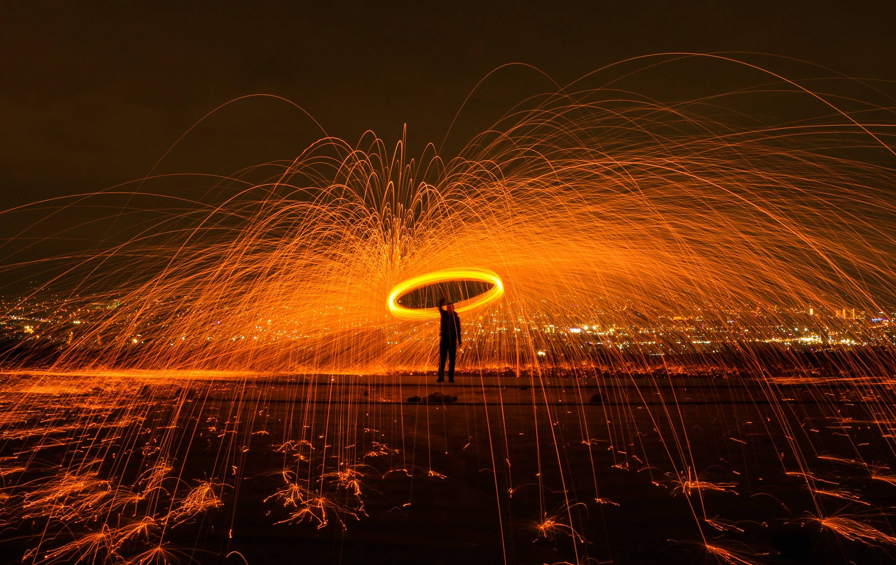 spinning 4k fire, lone figure, night, HD Desktop Wallpaper