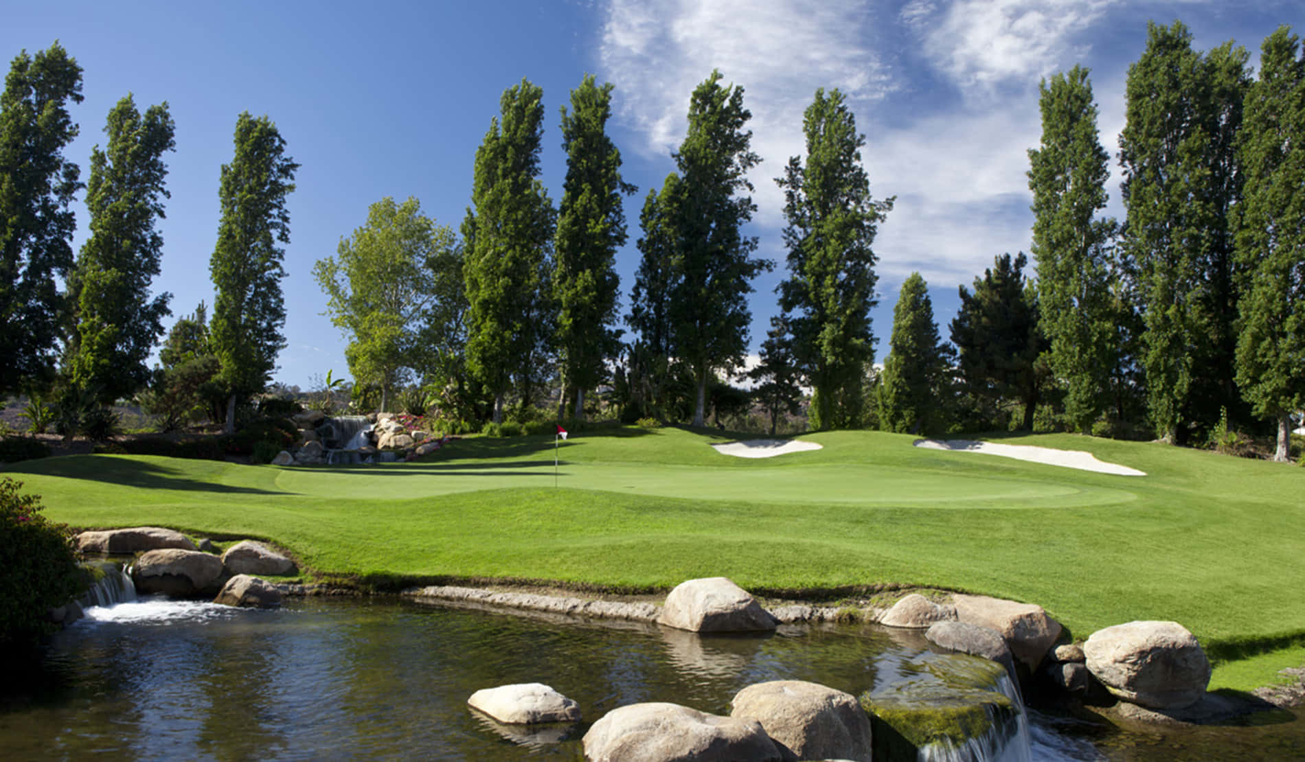 golf course green, tall trees, rocky water feature, HD Desktop Wallpaper