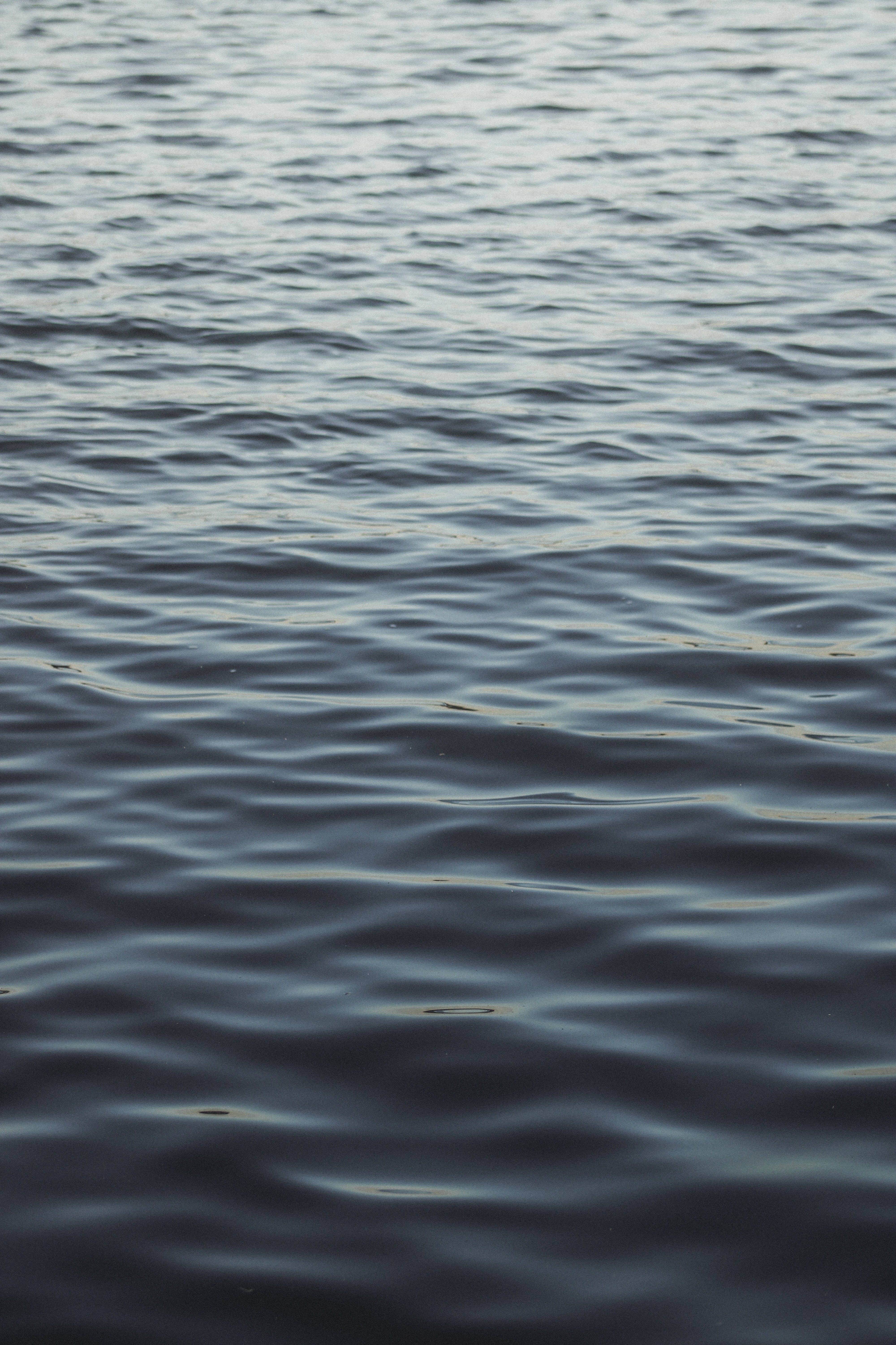 4K iPhone 6 Plus, dark rippling water, golden reflections, 5K Phone Wallpaper