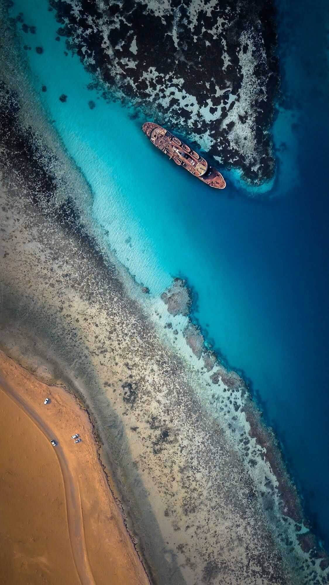 4K iPhone, aerial view, rusted shipwreck, Full HD Phone Wallpaper