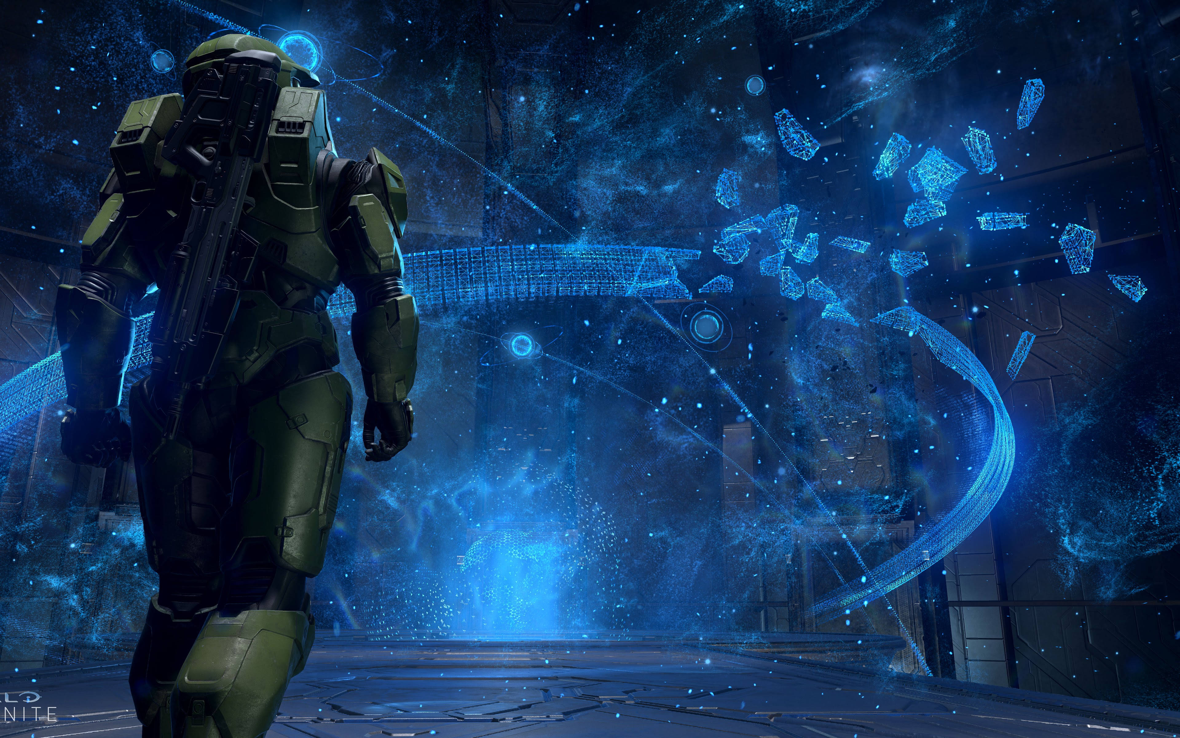 Master Chief, green armor, glowing blue holographic interface, 4K Desktop Wallpaper