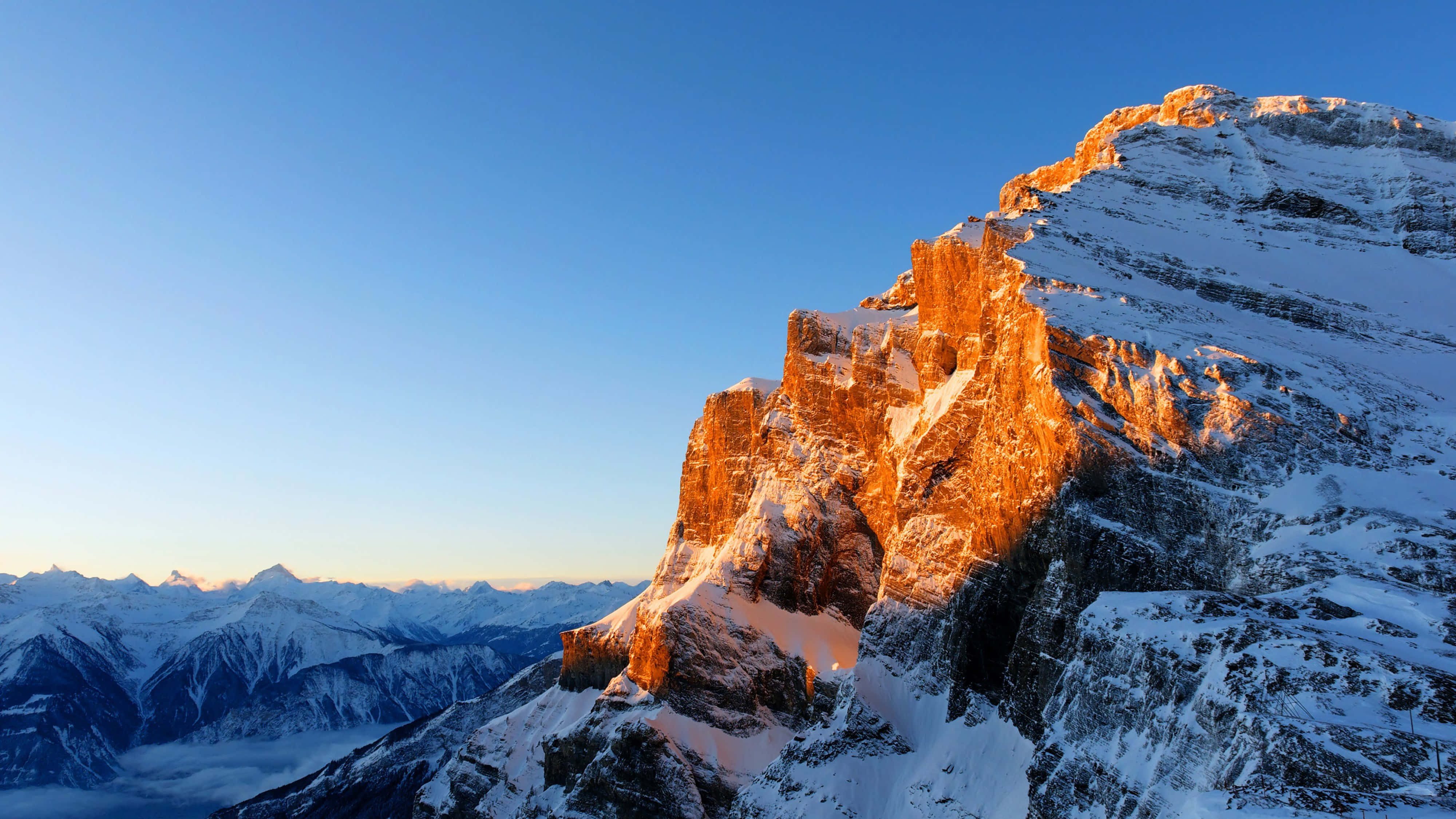4K Mountain, snowcapped mountain ridge, golden sunrise light, 4K Desktop Wallpaper
