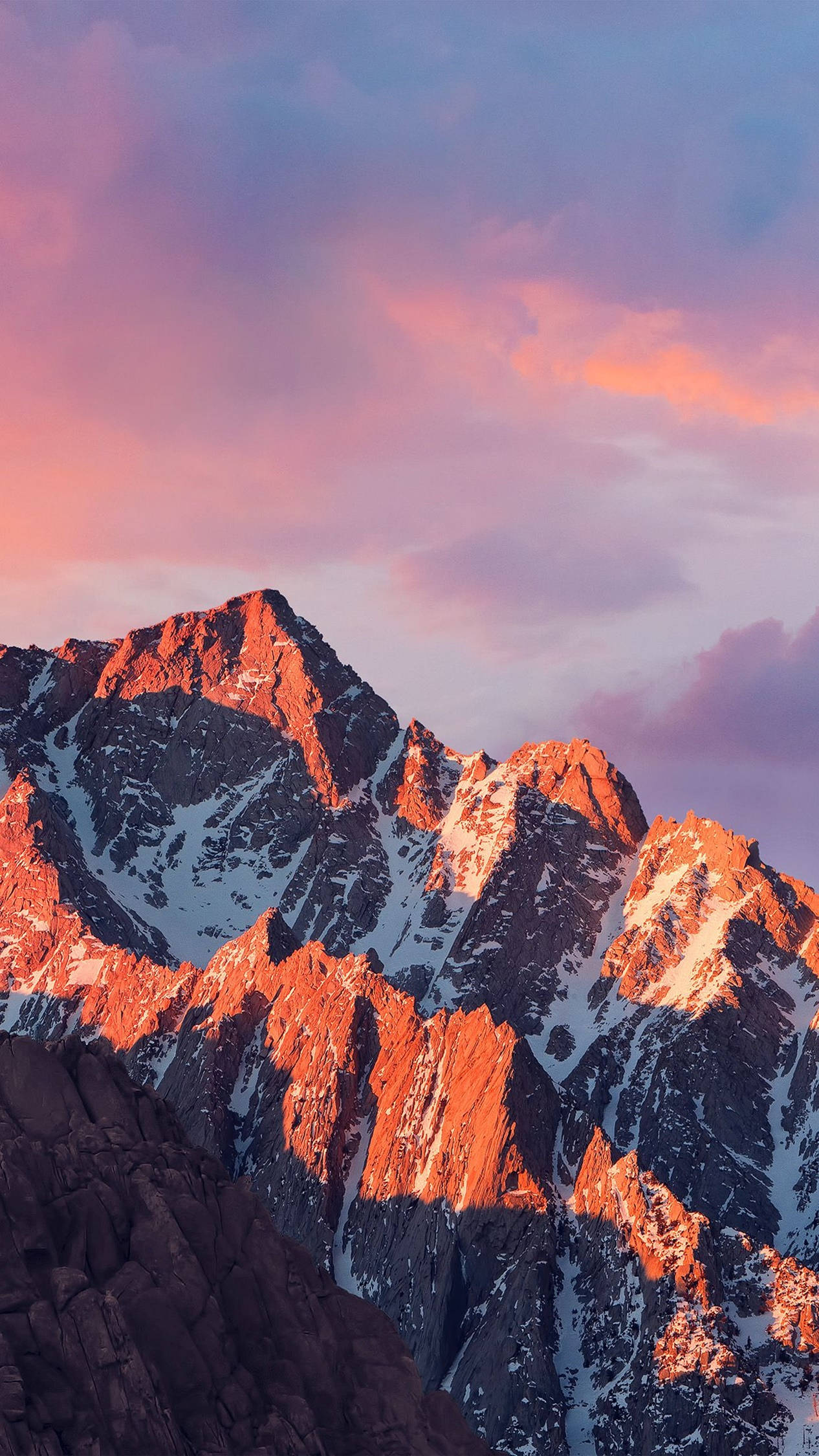 4K Android Mountains, snowcapped mountain peaks, warm pink and orange hues, Full HD Phone Wallpaper