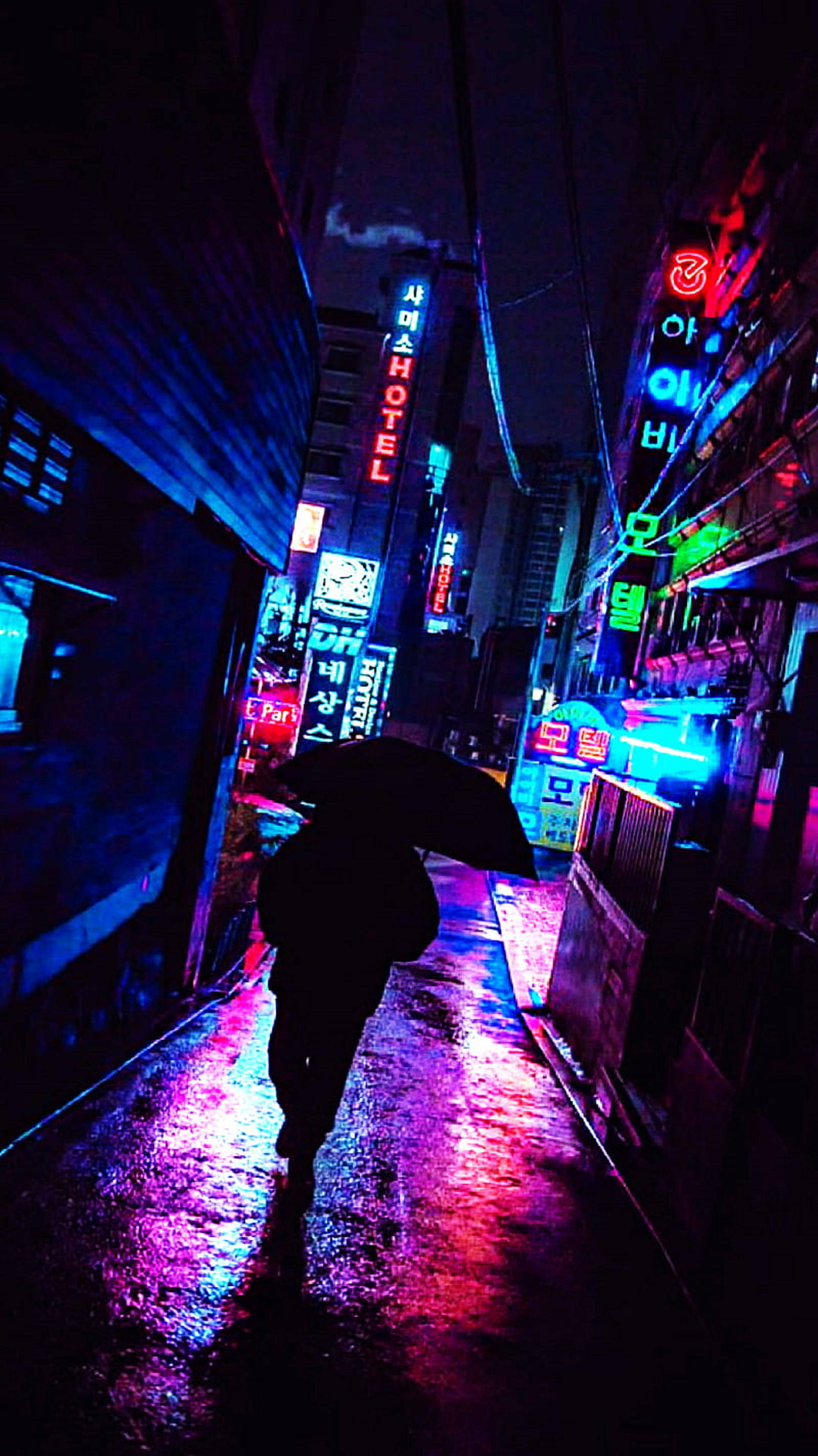 4K Neon iPhone, person with umbrella, neon-drenched rain-soaked alley, 4K Phone Wallpaper