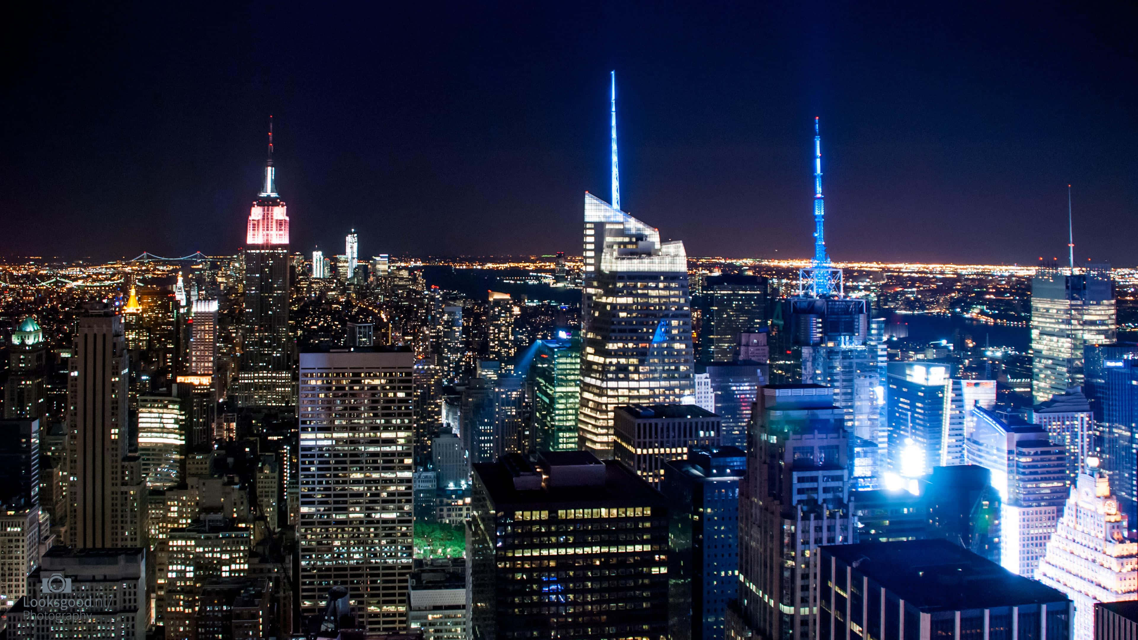 New York City, nighttime cityscape, illuminated skyscrapers, 4K Desktop Wallpaper