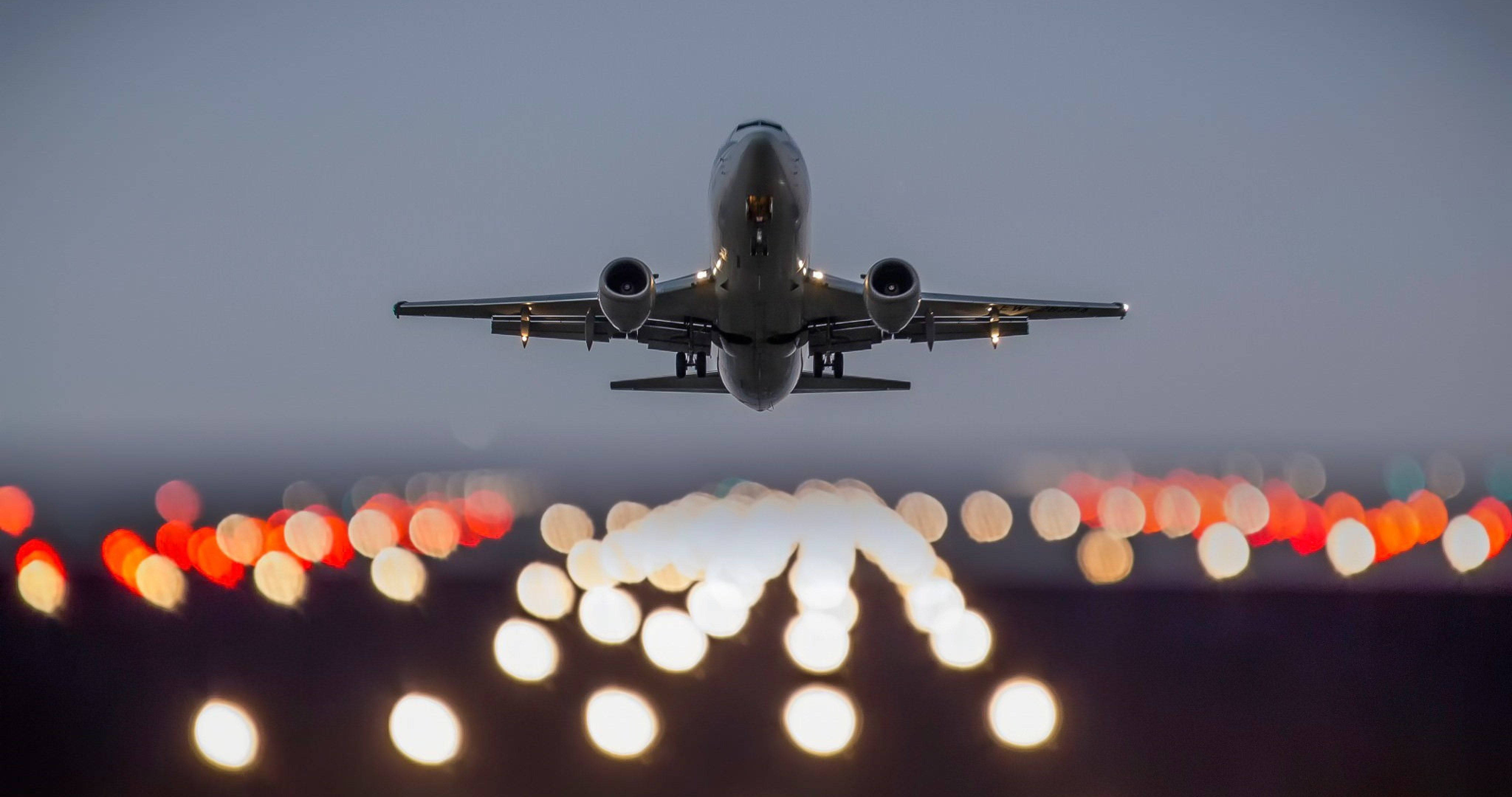 4K Plane, runway, blurred bokeh lights, 4K Desktop Wallpaper