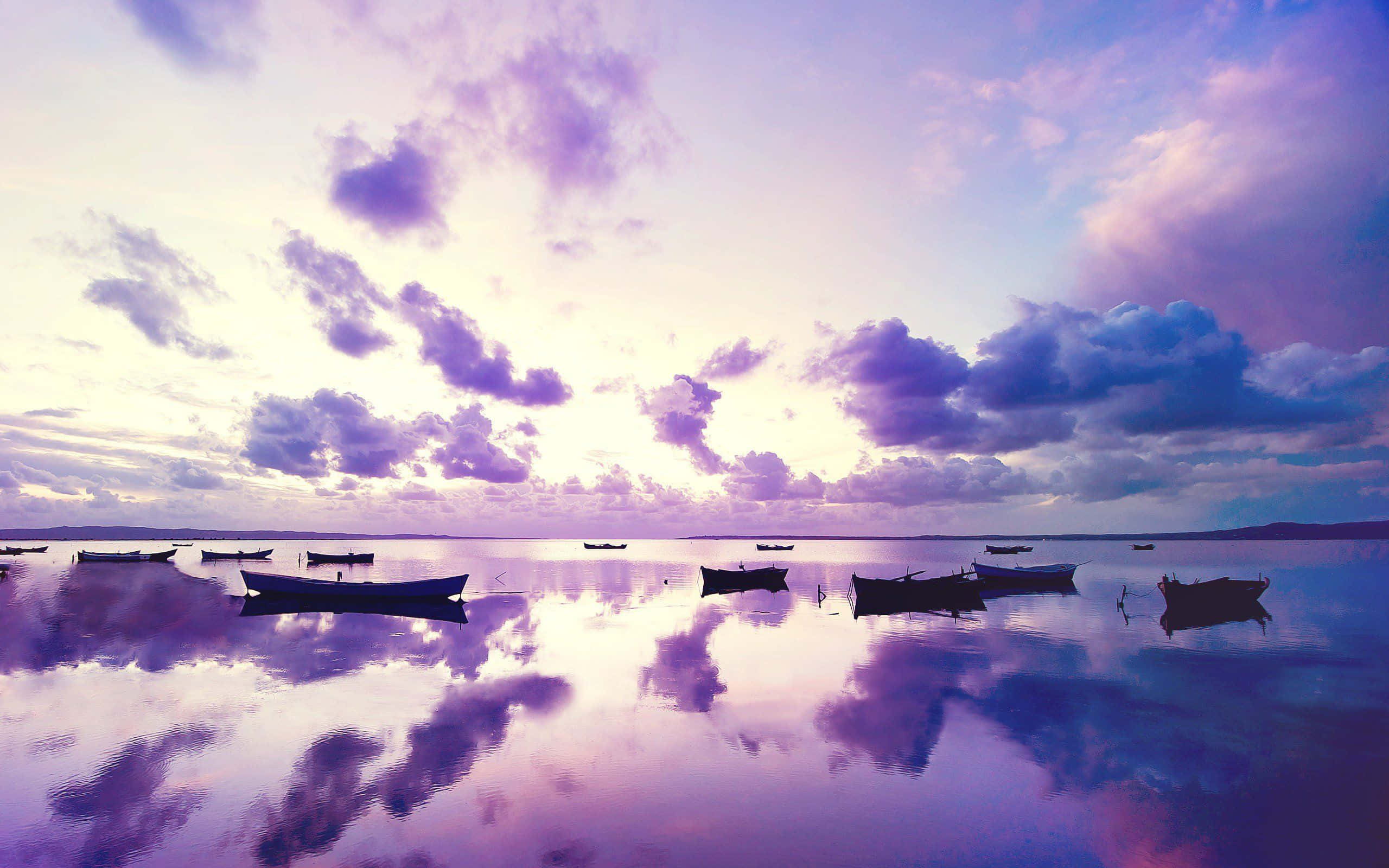 purple sunset, calm lake, silhouetted boats, 2K Desktop Wallpaper