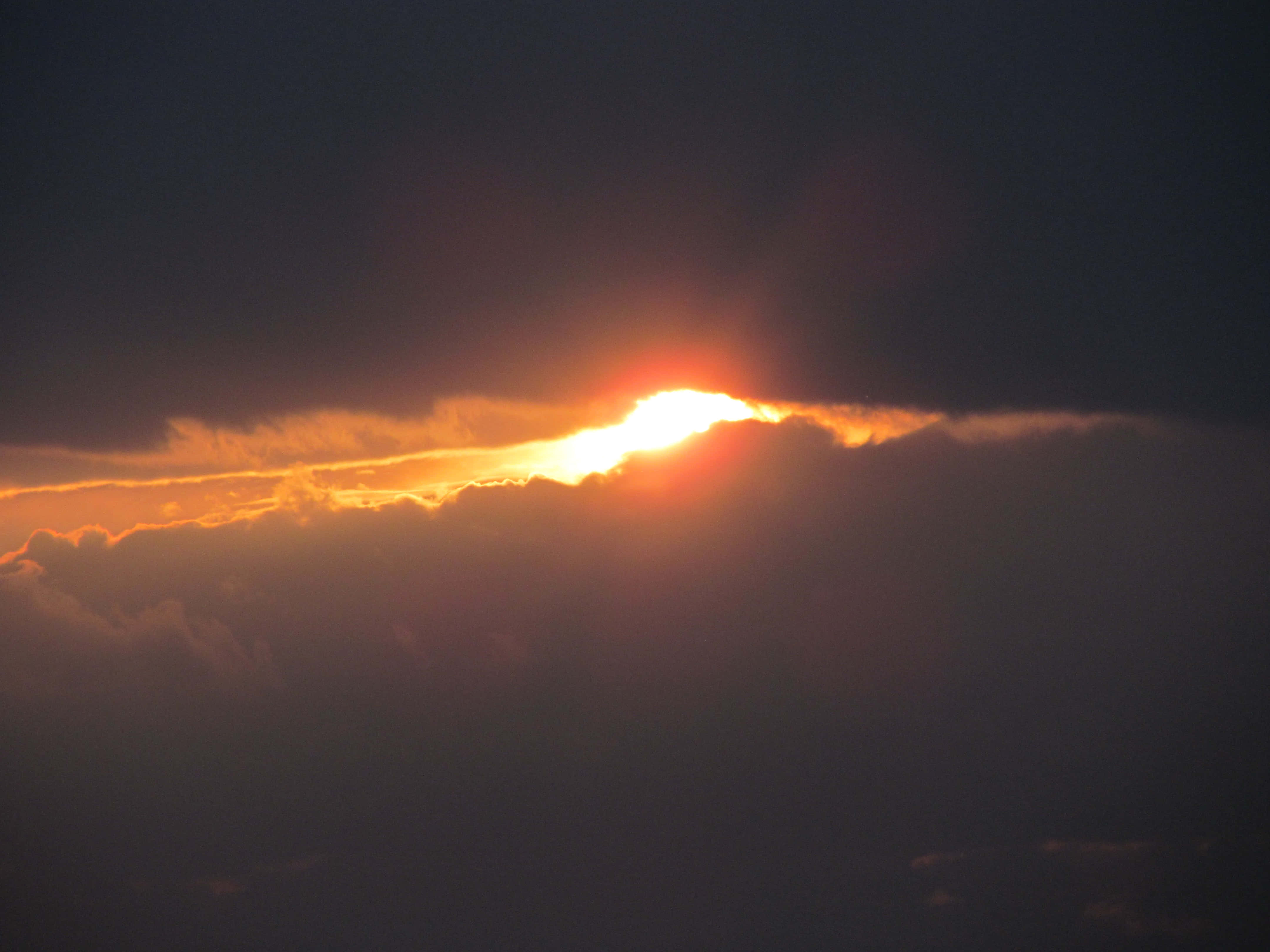 glowing sunrise, orange sun, dark storm clouds, 4K Desktop Wallpaper