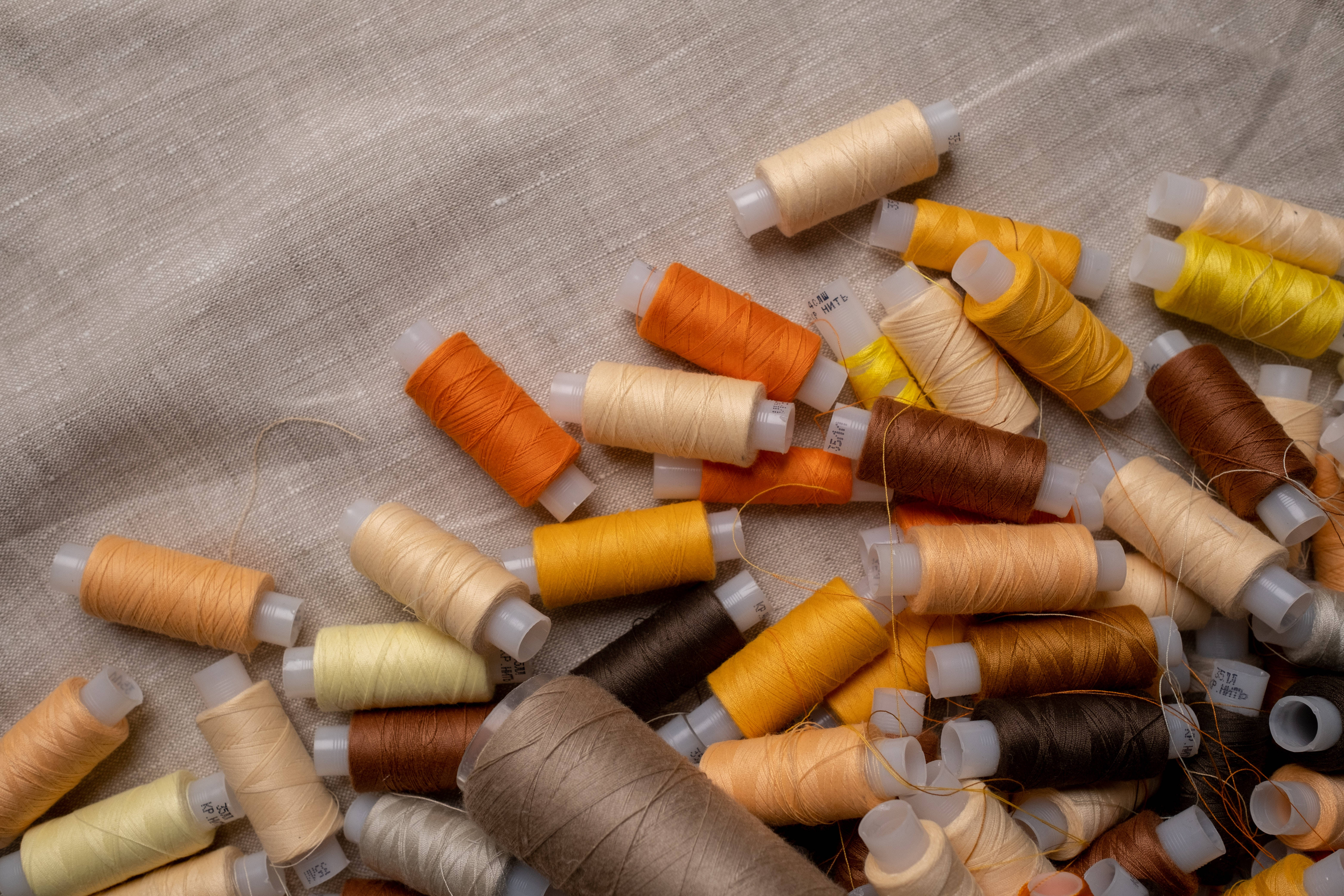 4K Tablet, yellow thread spools, warm earth tones, 5K Desktop Wallpaper