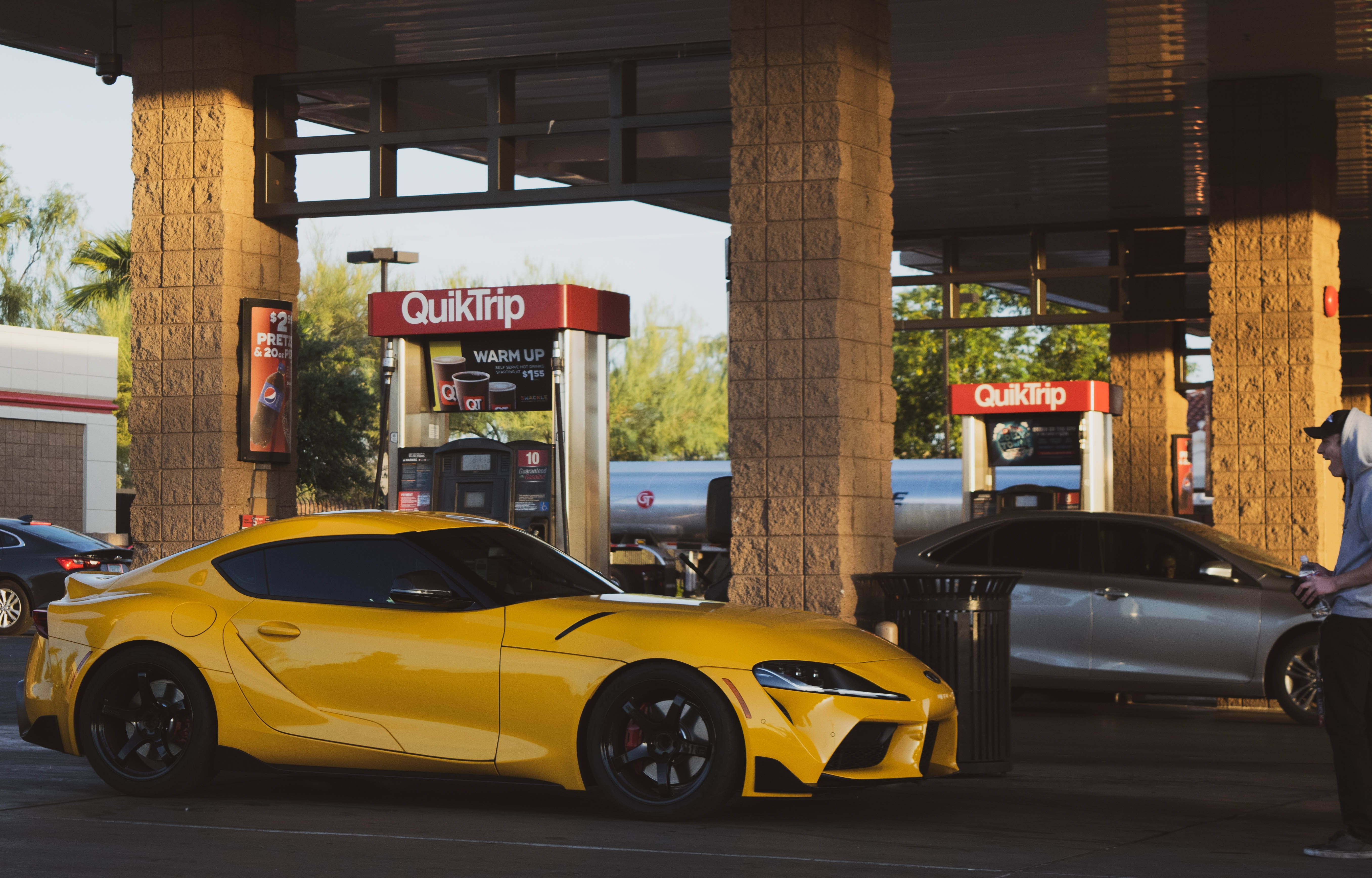 4K Toyota Supra, gas station, vibrant yellow, 5K Desktop Wallpaper