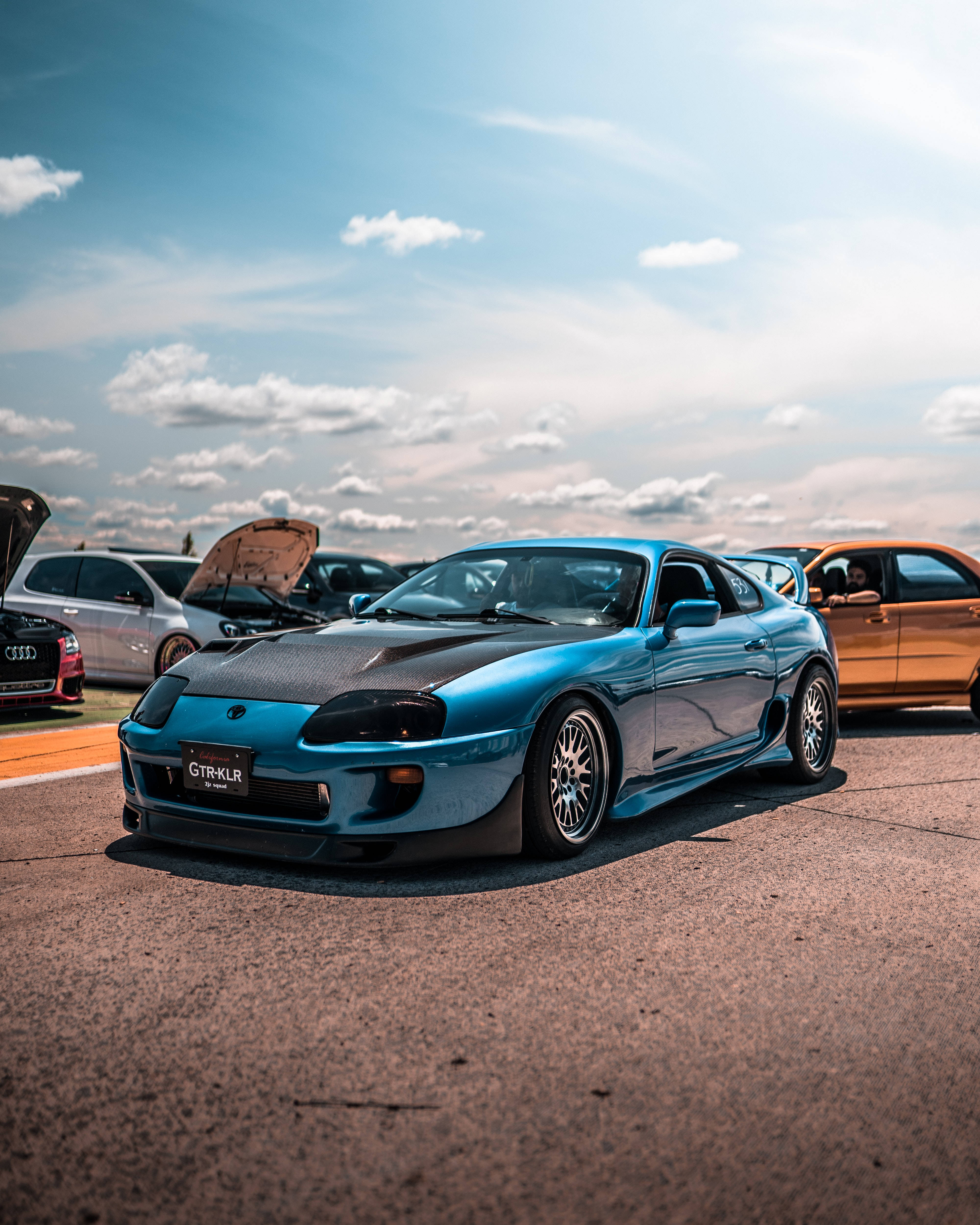 4K Toyota Supra, vibrant blue, black hood, 4K Phone Wallpaper