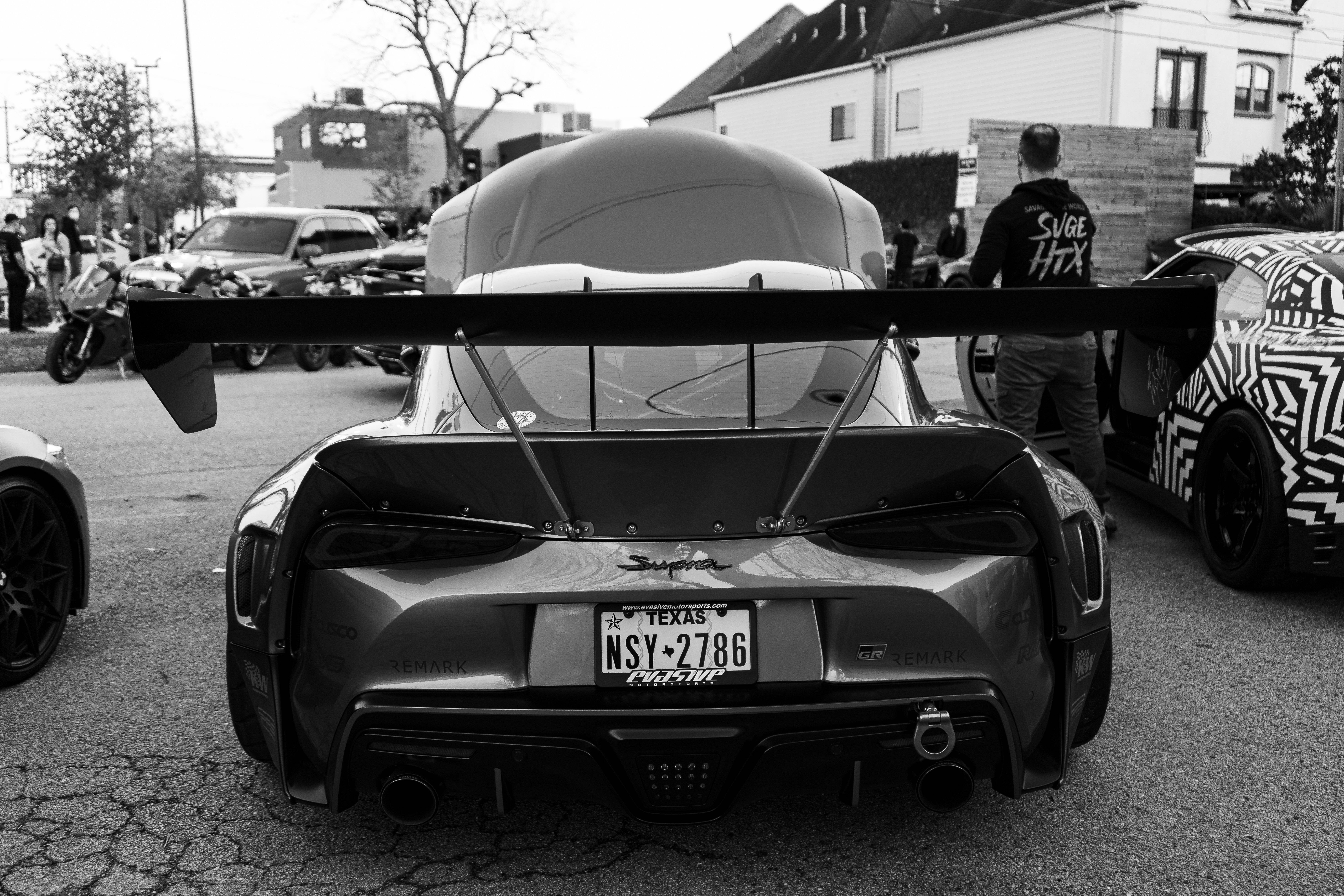 4K Toyota Supra, high spoiler, black and white photo, 8K Desktop Wallpaper