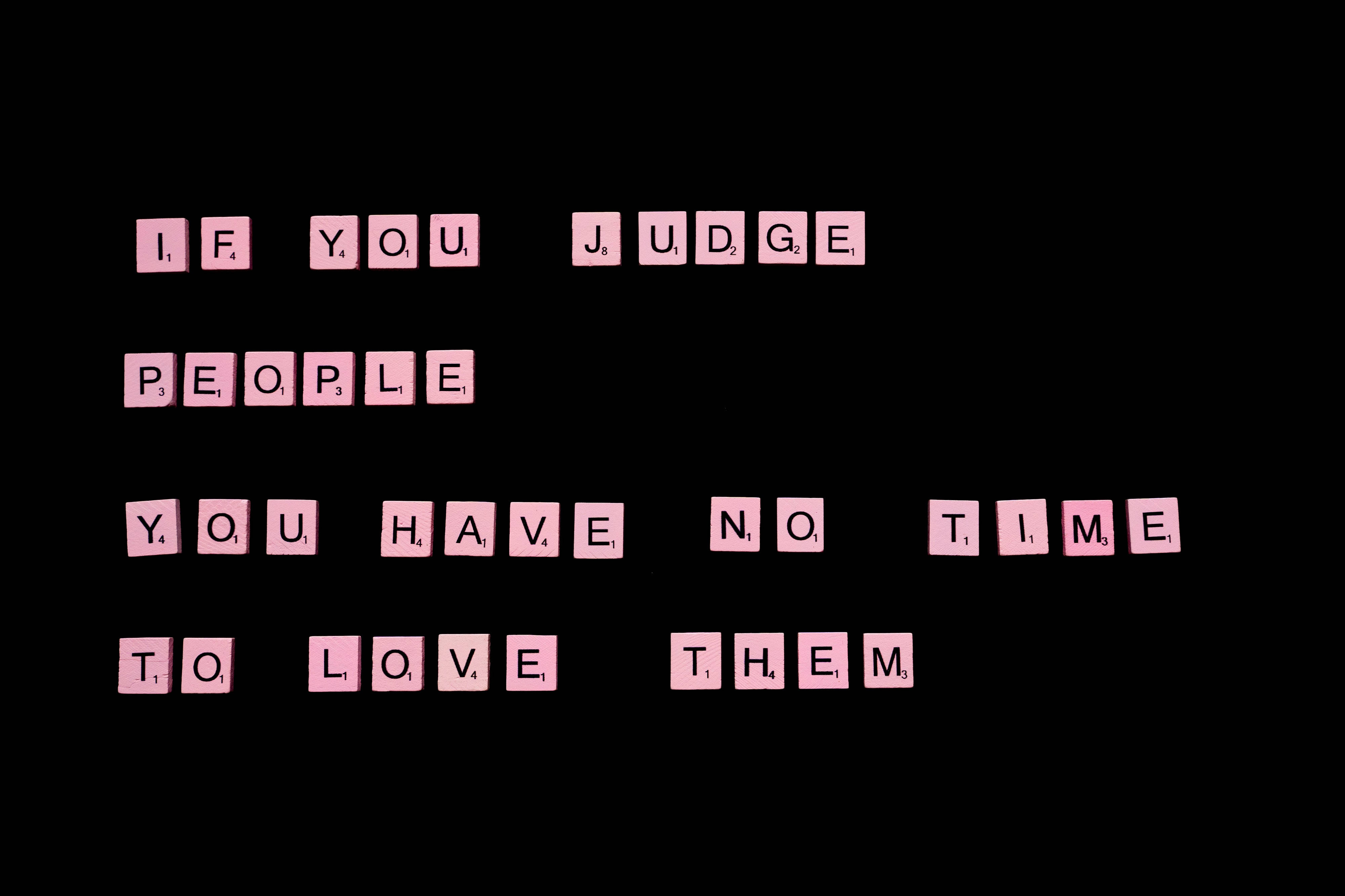 Pink scrabble tiles, stark black background, quote, 4K Desktop Wallpaper