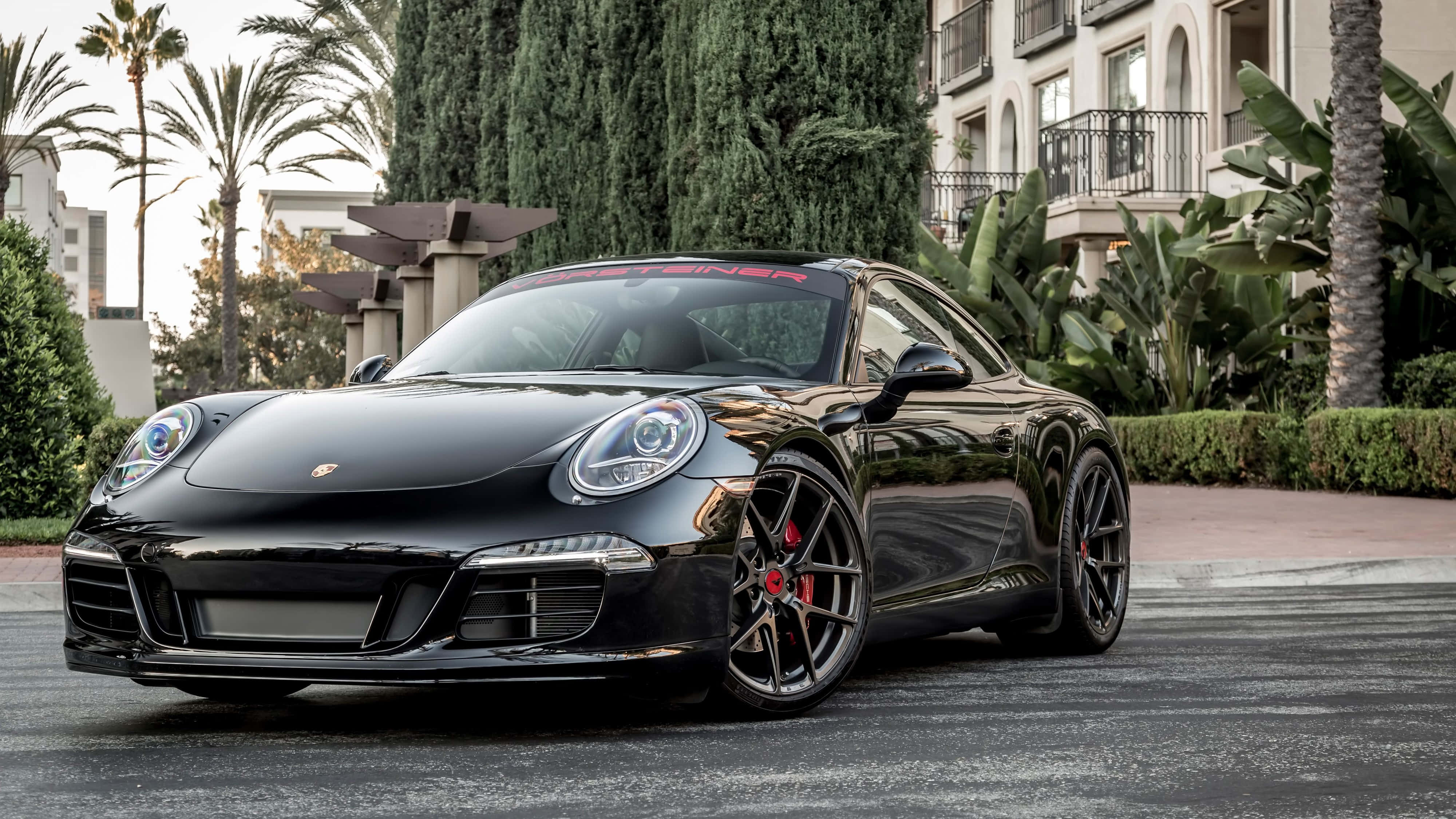 Porsche 911, glossy black, paved driveway, 4K Desktop Wallpaper