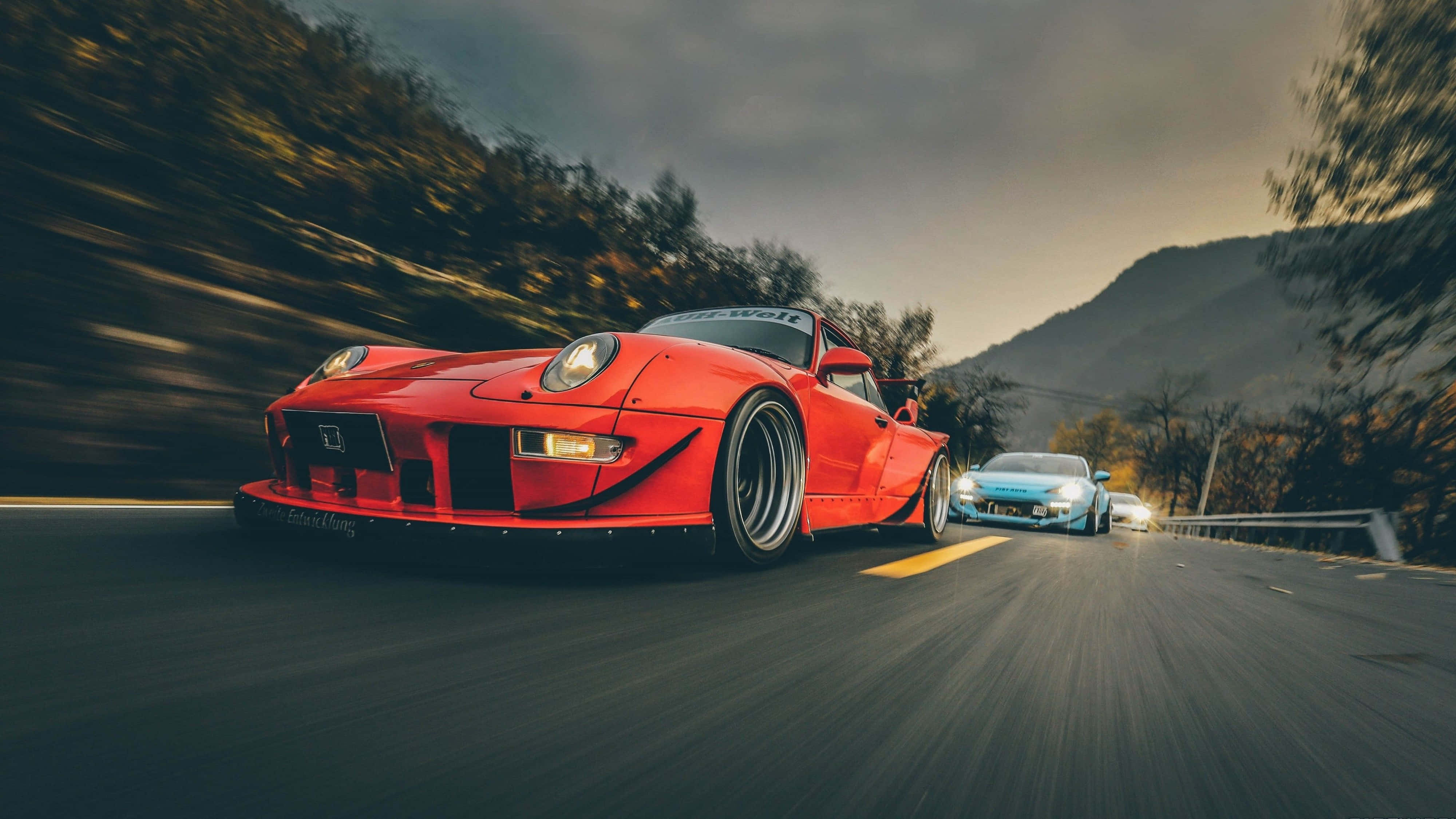 4K Ultra HD Porsche, red modified sports car, winding mountain road, 4K Desktop Wallpaper