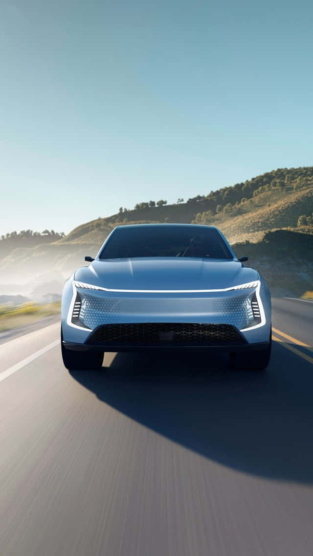 640x1136, sleek silver futuristic car, winding mountain road, SD Phone Wallpaper