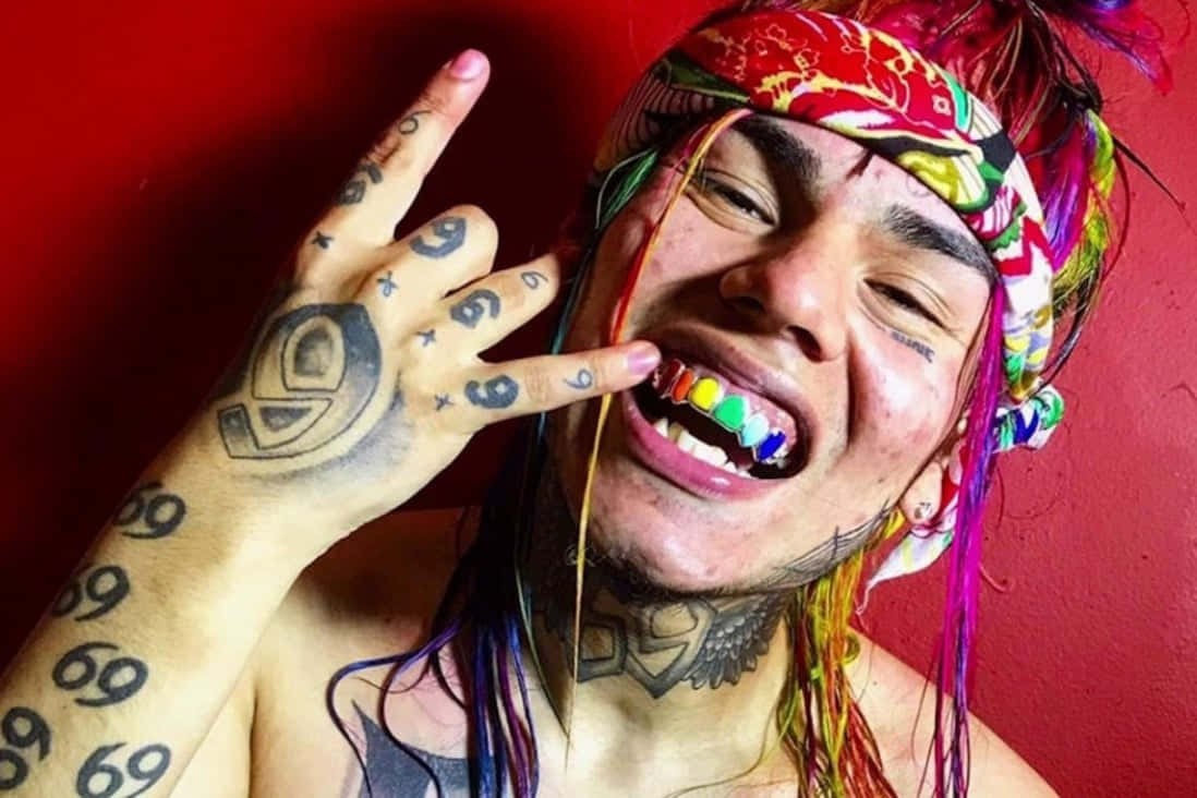69 Rapper, rainbow hair, colorful grillz, SD Desktop Wallpaper