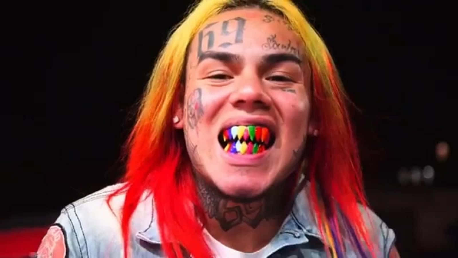 69 Rapper, vibrant red and yellow hair, colorful teeth, HD Desktop Wallpaper