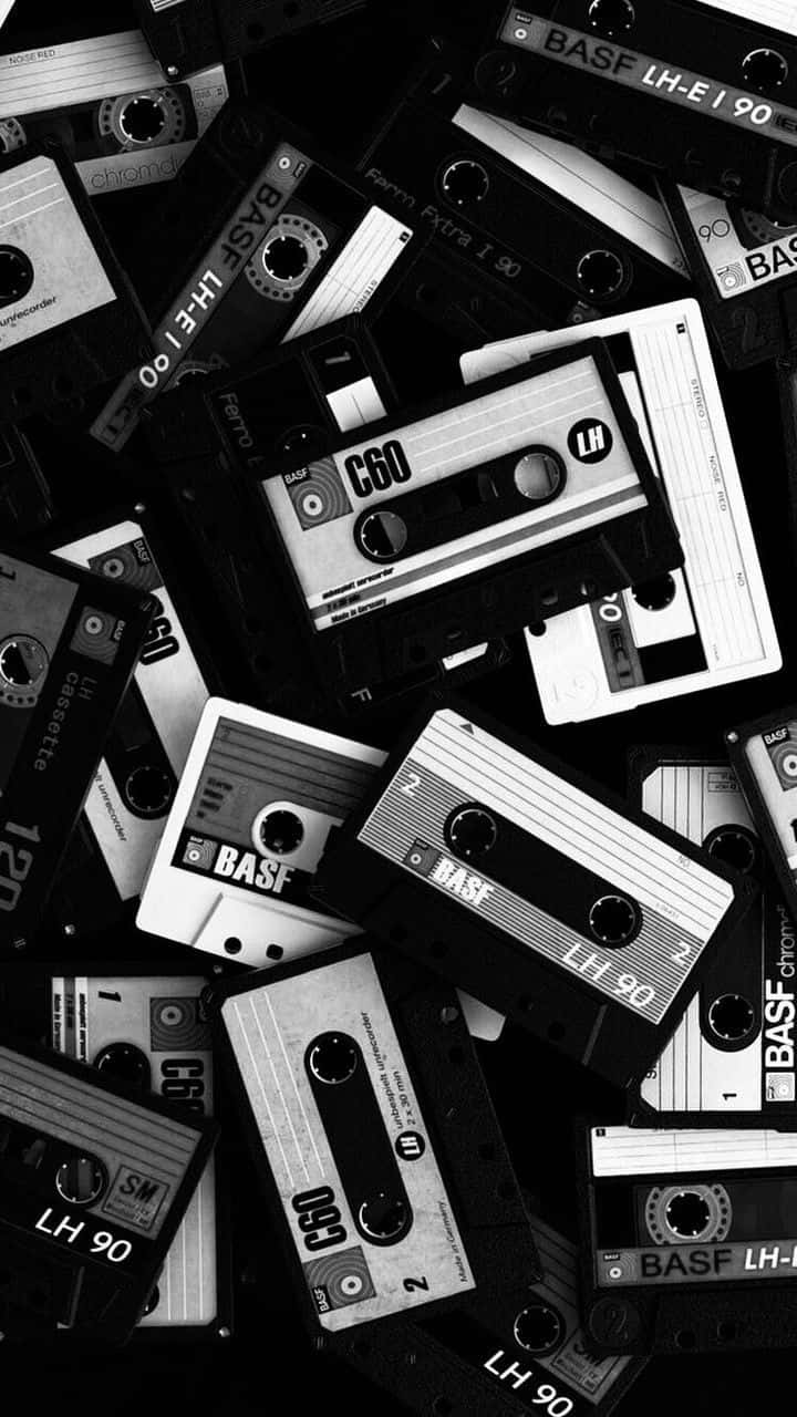 90s black, vintage audio cassette tapes, monochrome overhead shot, HD Phone Wallpaper