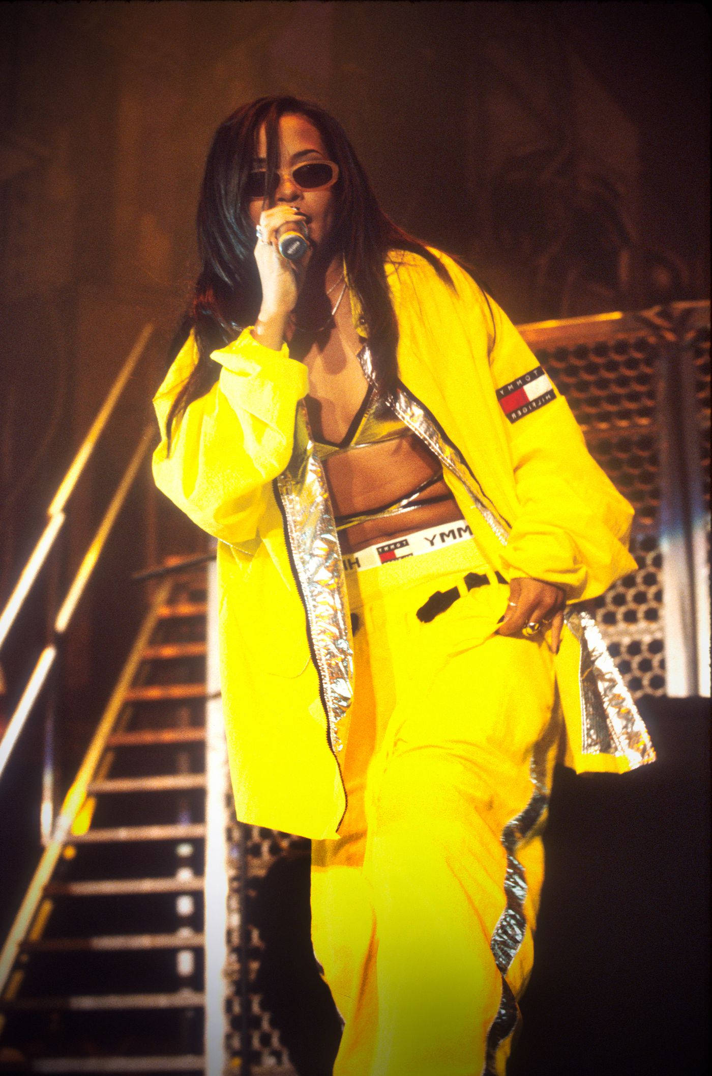 Aaliyah, yellow, dimly lit stage, Full HD Phone Wallpaper