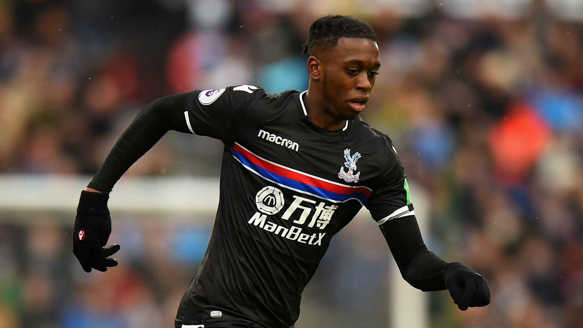 Aaron Wan-Bissaka, black Crystal Palace jersey, daytime match, Full HD Desktop Wallpaper
