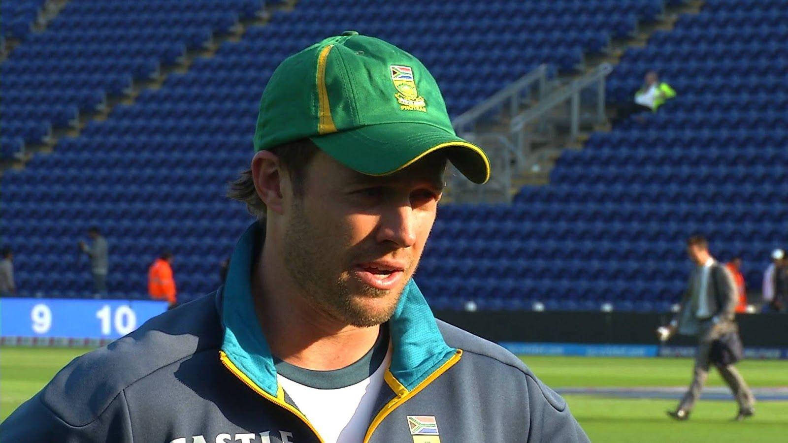 Ab De Villiers, green cap, blue jacket, HD Desktop Wallpaper